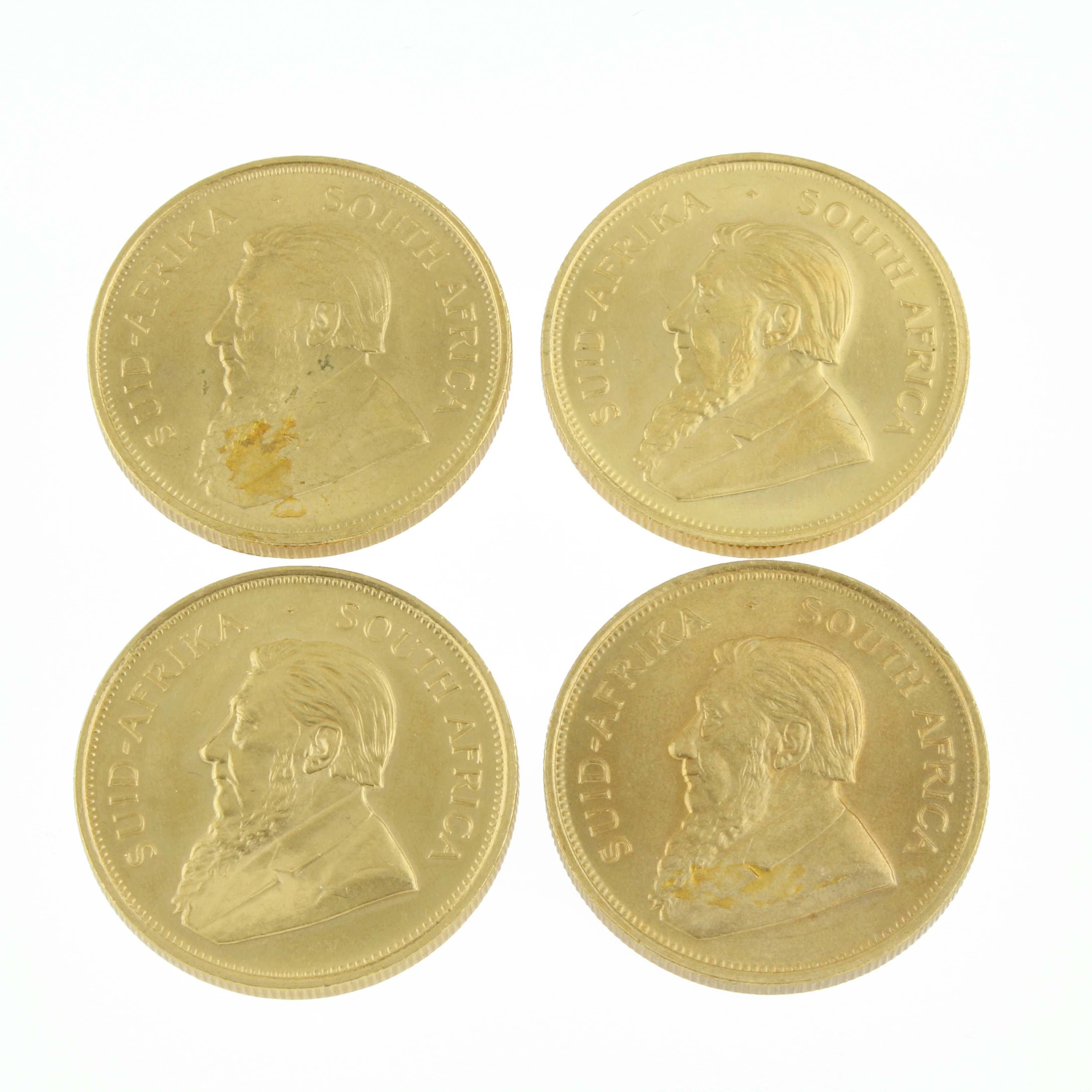 CUATRO MONEDAS EN ORO SUDAFRICANAS.