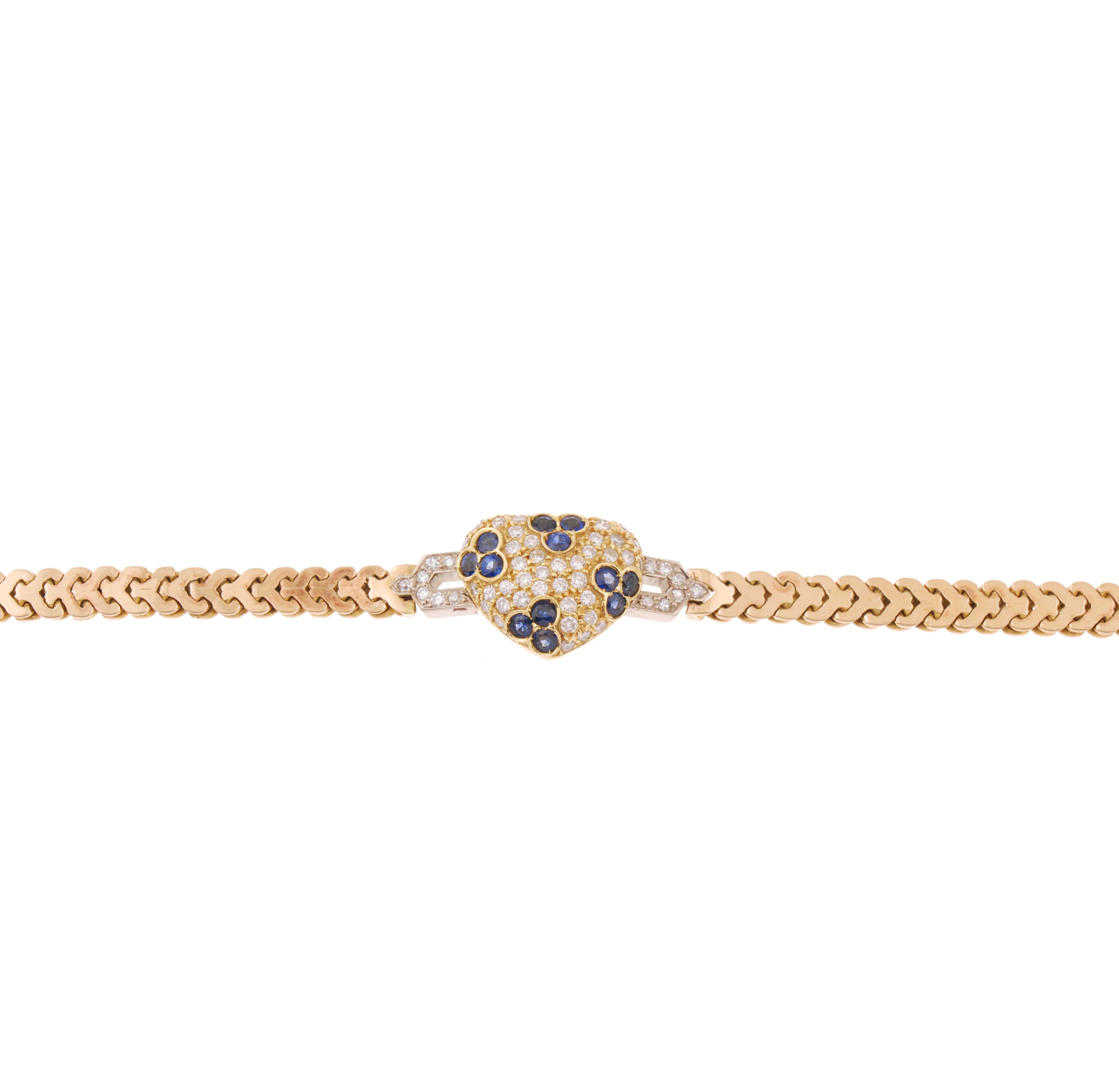GOLD HEART BRACELET WITH DIAMONDS AND SAPPHIRES. 