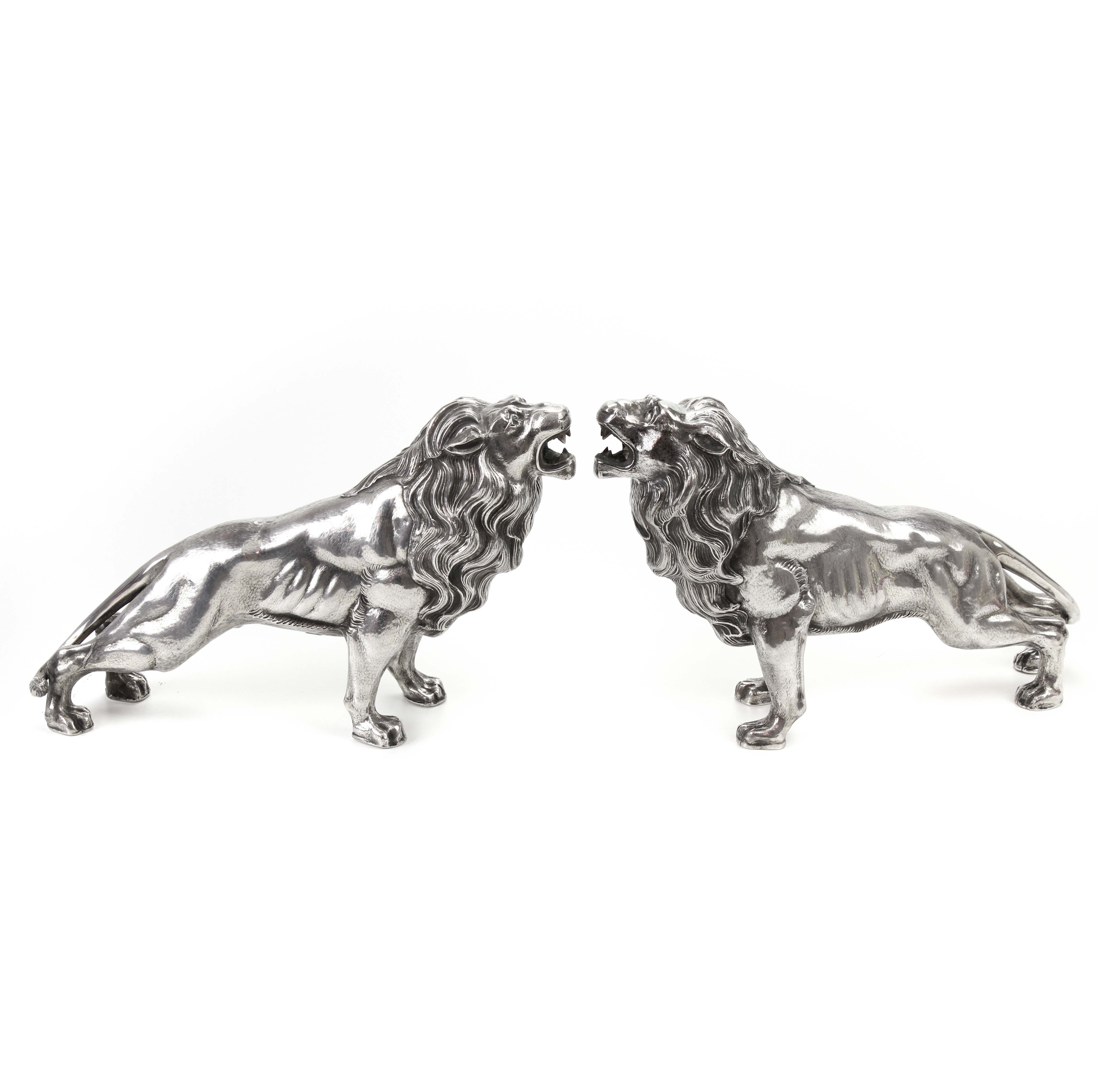 PAIR OF SPANISH SILVER LIONS, MID C20th.