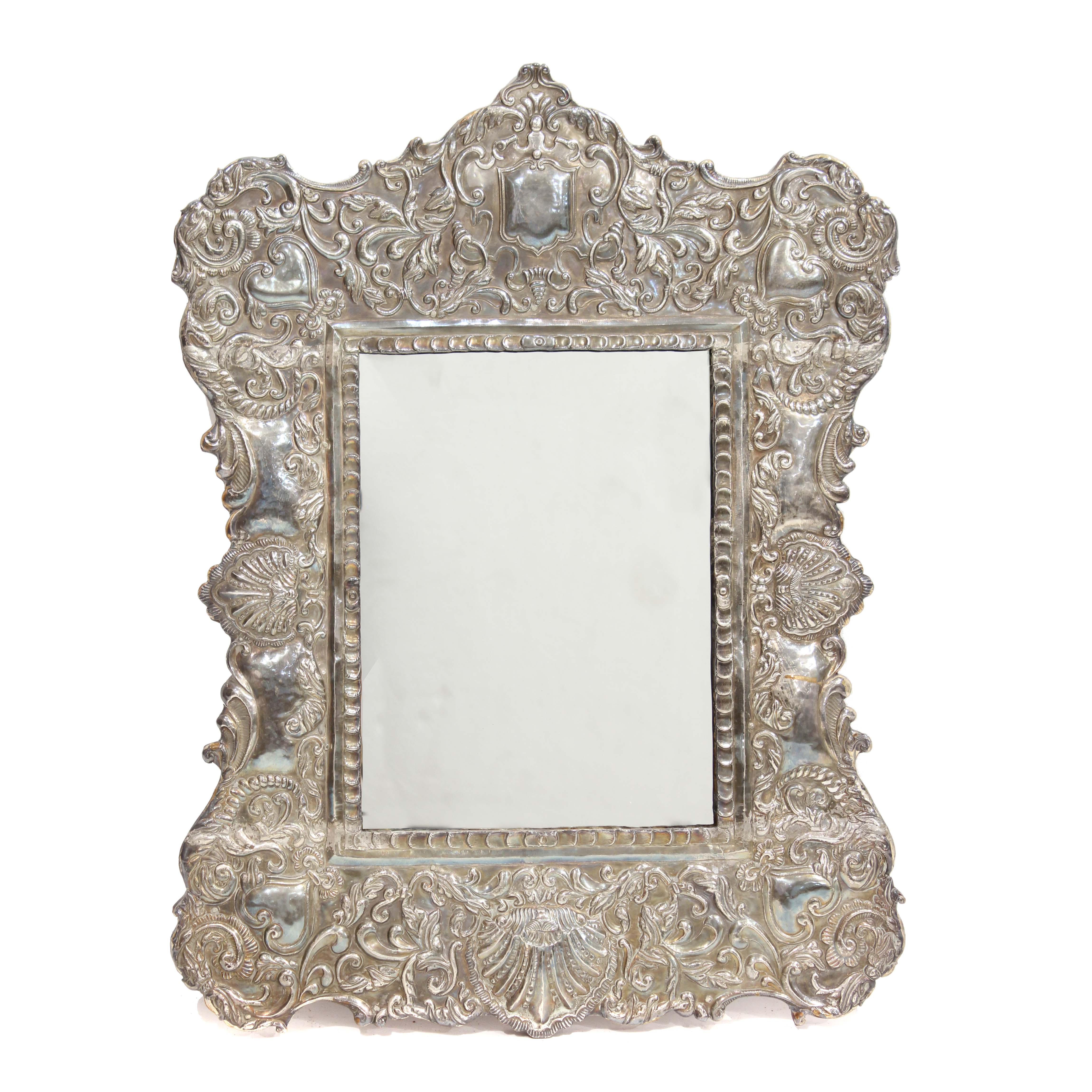 TABLE TOP MIRROR WITH SILVER FRAME, PROBABLY END C16th.