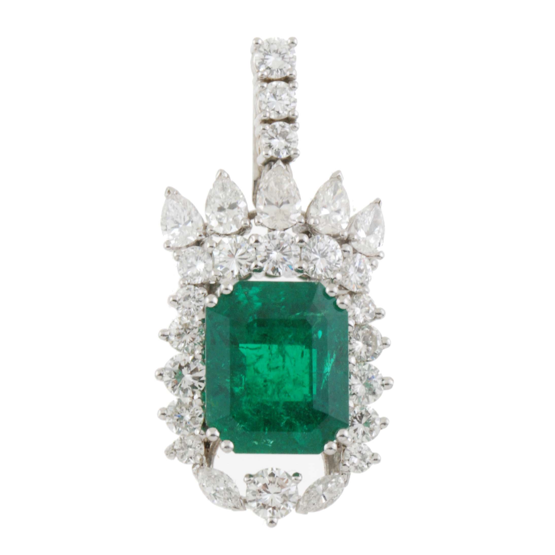 DIAMOND AND EMERALD PENDANT, MID C20th.  