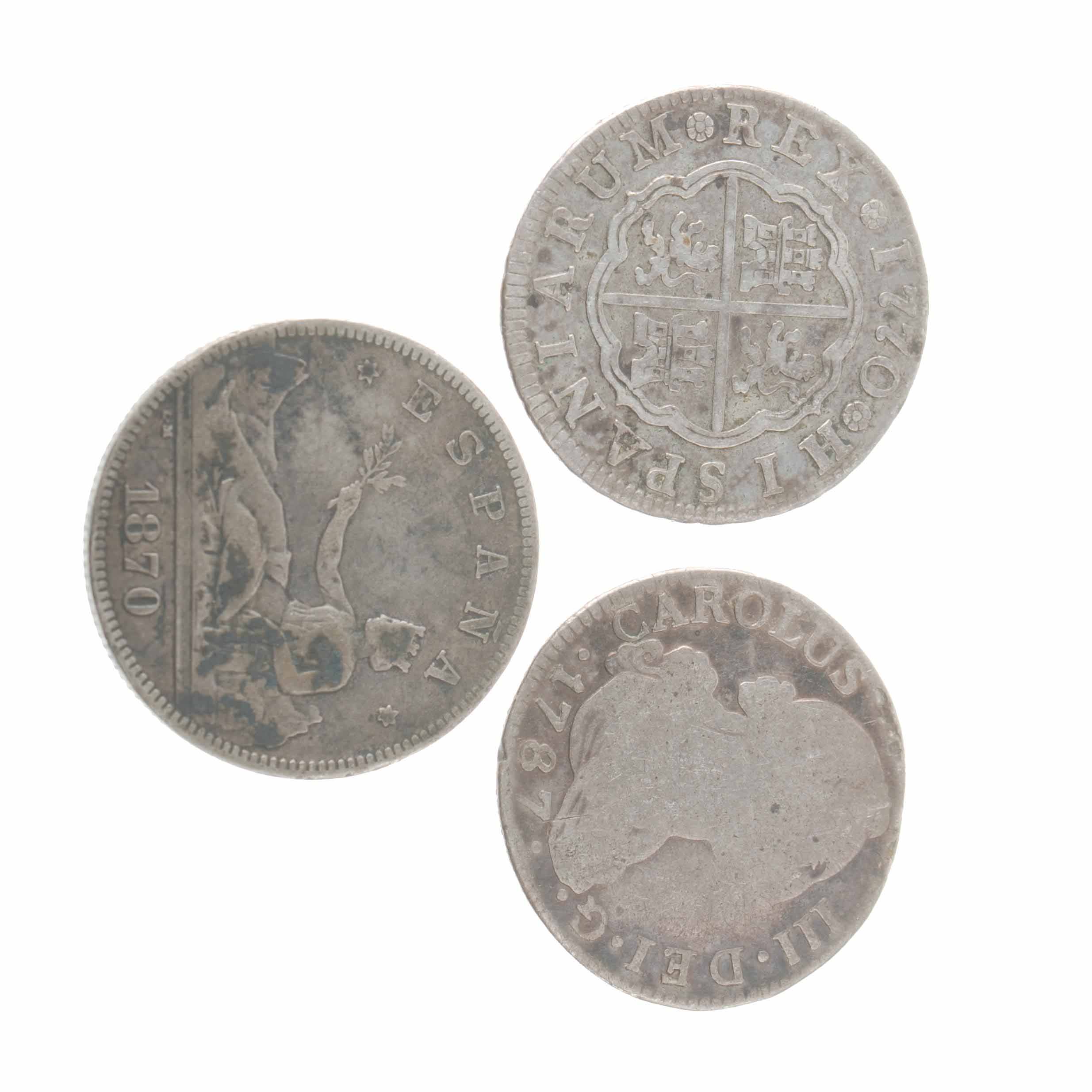 THREE SILVER COINS.