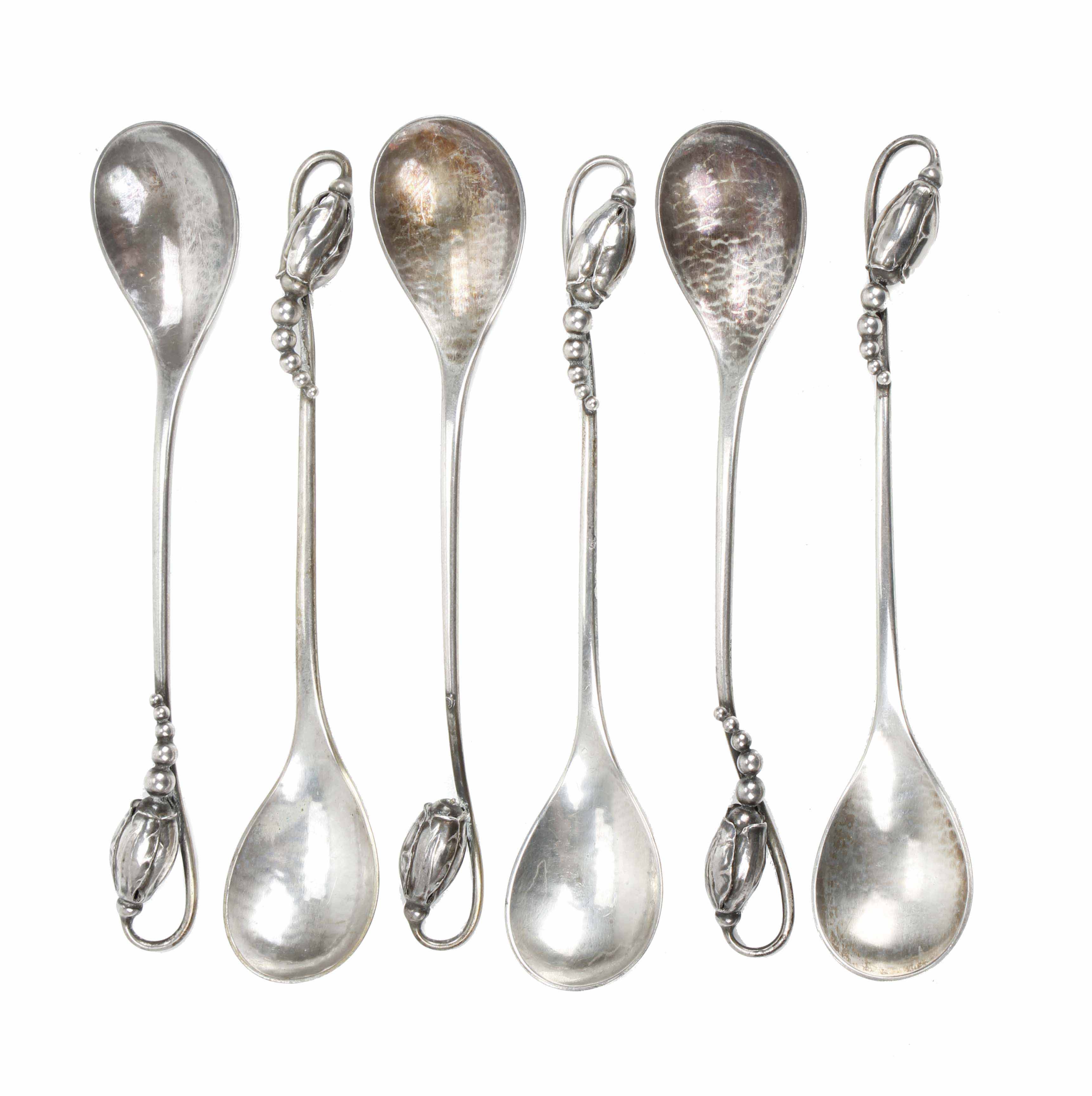 GEORG JENSEN (1866-1935). JUEGO DE SEIS CUCHARILLAS EN PLAT