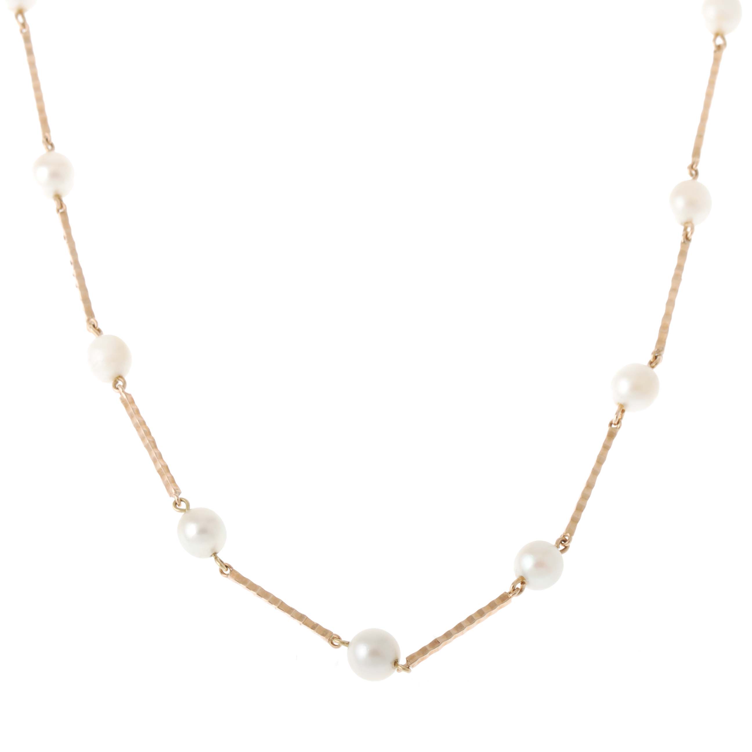 PEARLS AND GOLD LONG NECKLACE.