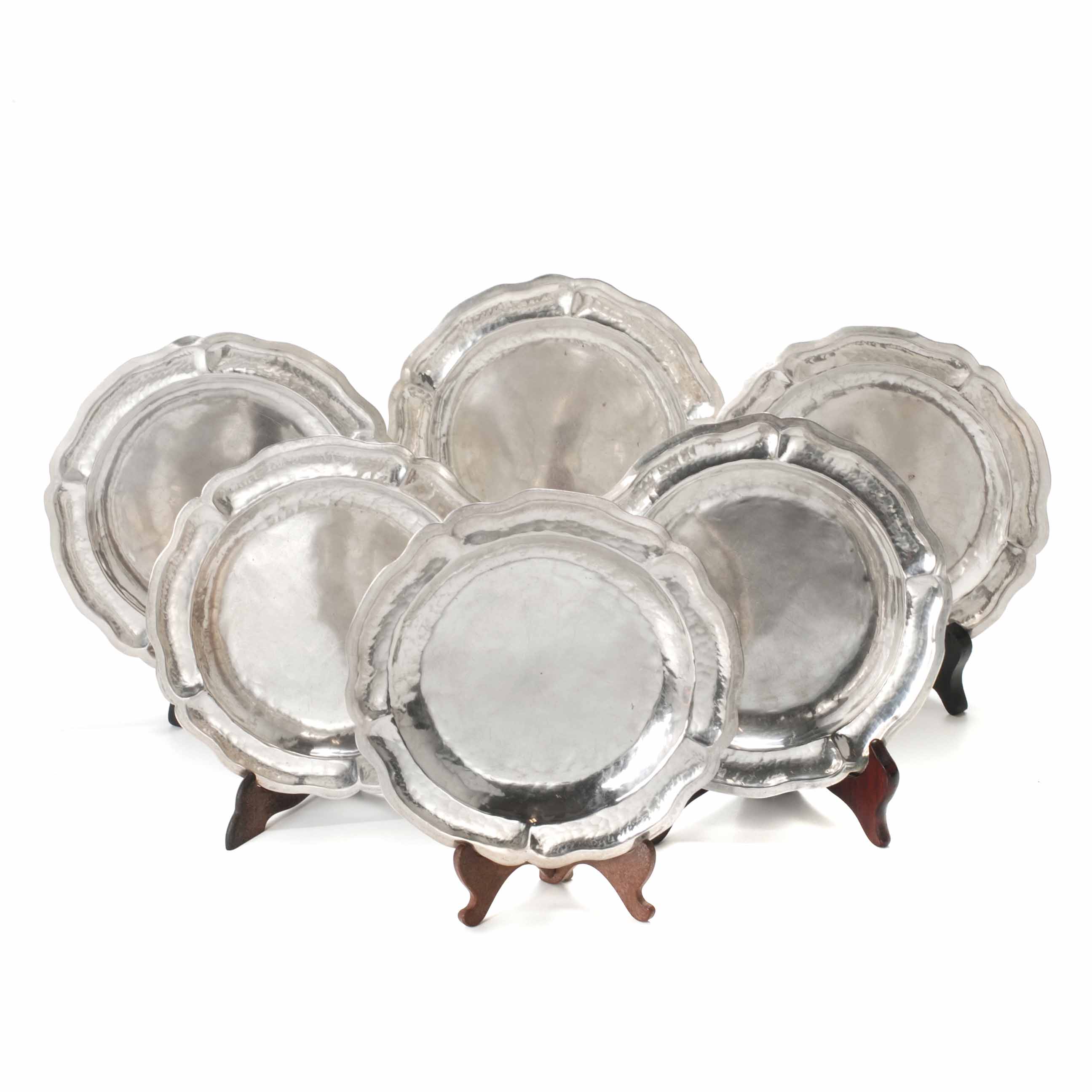 SET OF SIX PERUVIAN SILVER BREAD DISHES, MID 20TH CENTURY. 