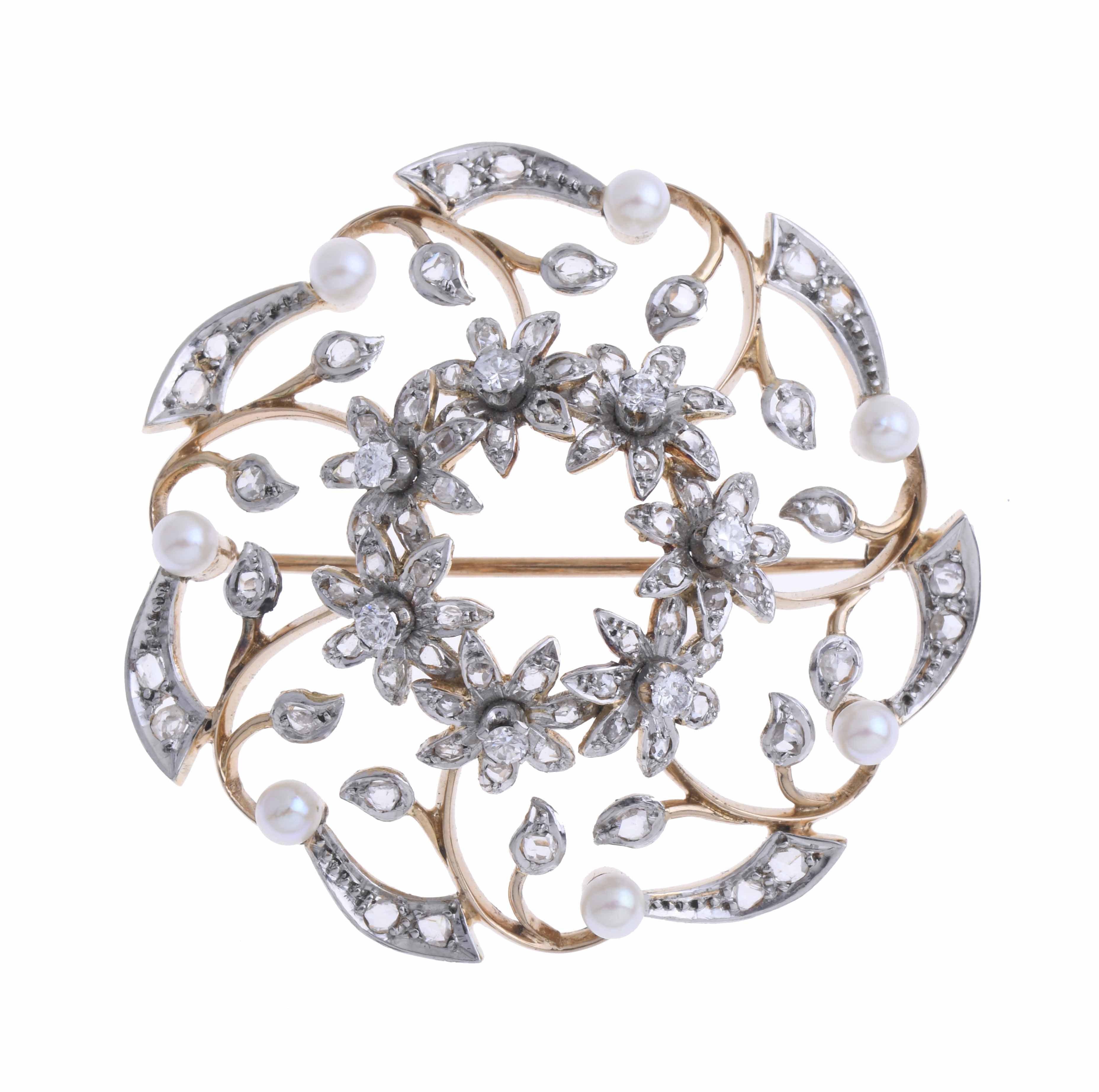 GOLD AND PLATINUM BROOCH.