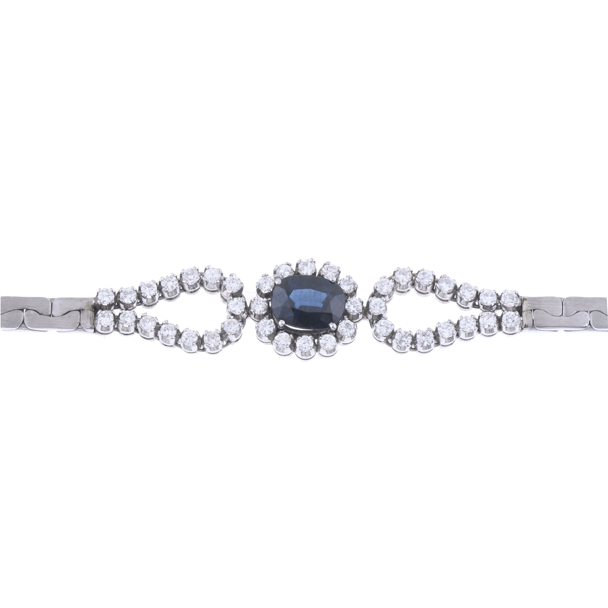 PLATINUM BRACELET WITH SAPPHIRE AND DIAMONDS.