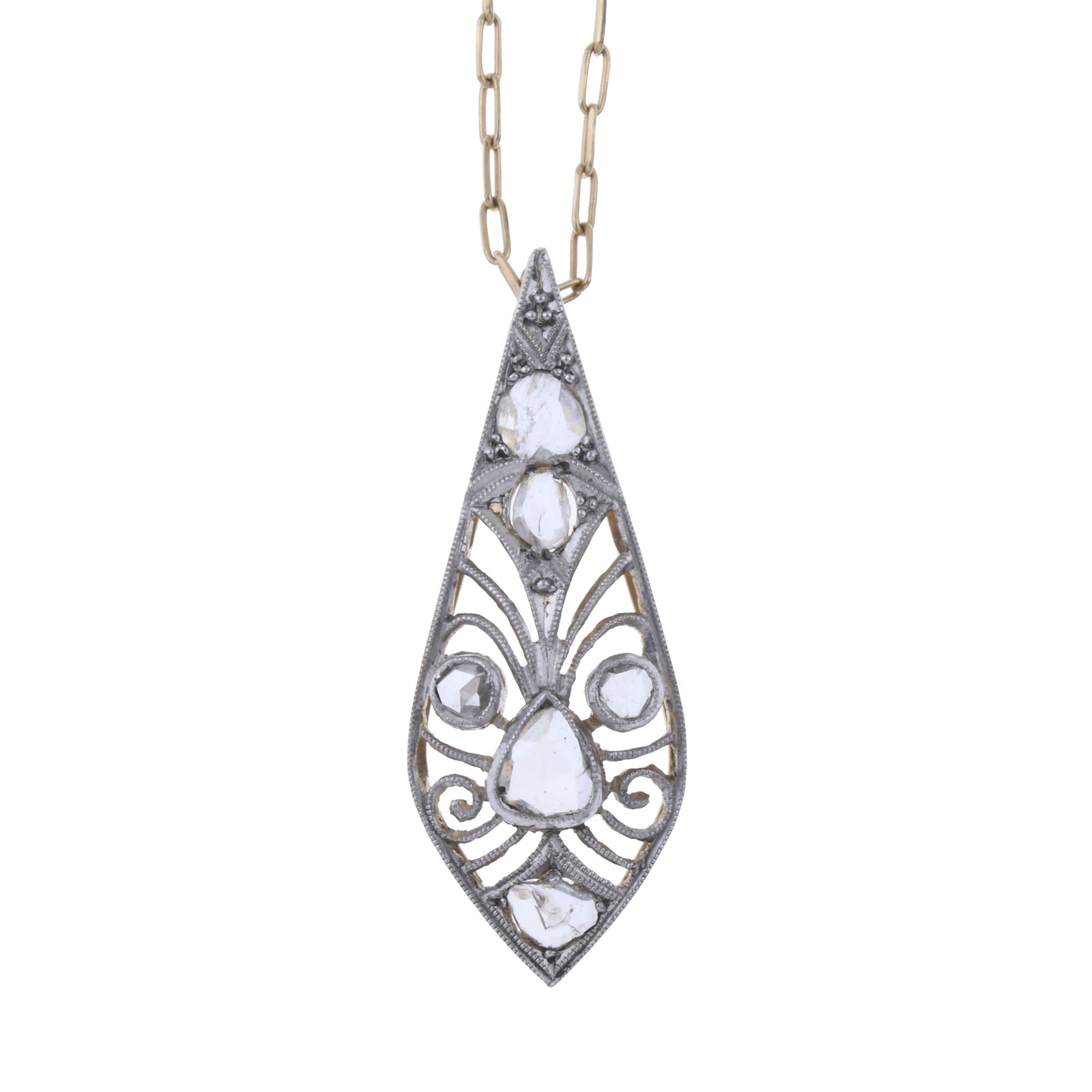 MODERNIST PENDANT IN YELLOW GOLD, PLATINUM AND DIAMONDS.