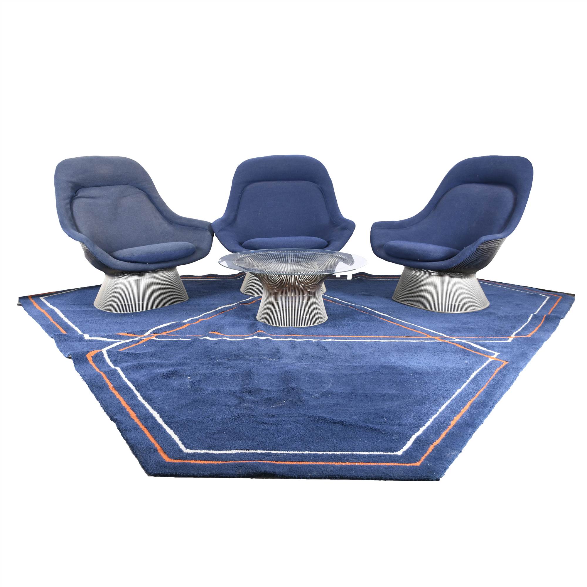 WARREN PLATNER (1919-2006). JUEGO DE TRES SILLONES Y MESA D