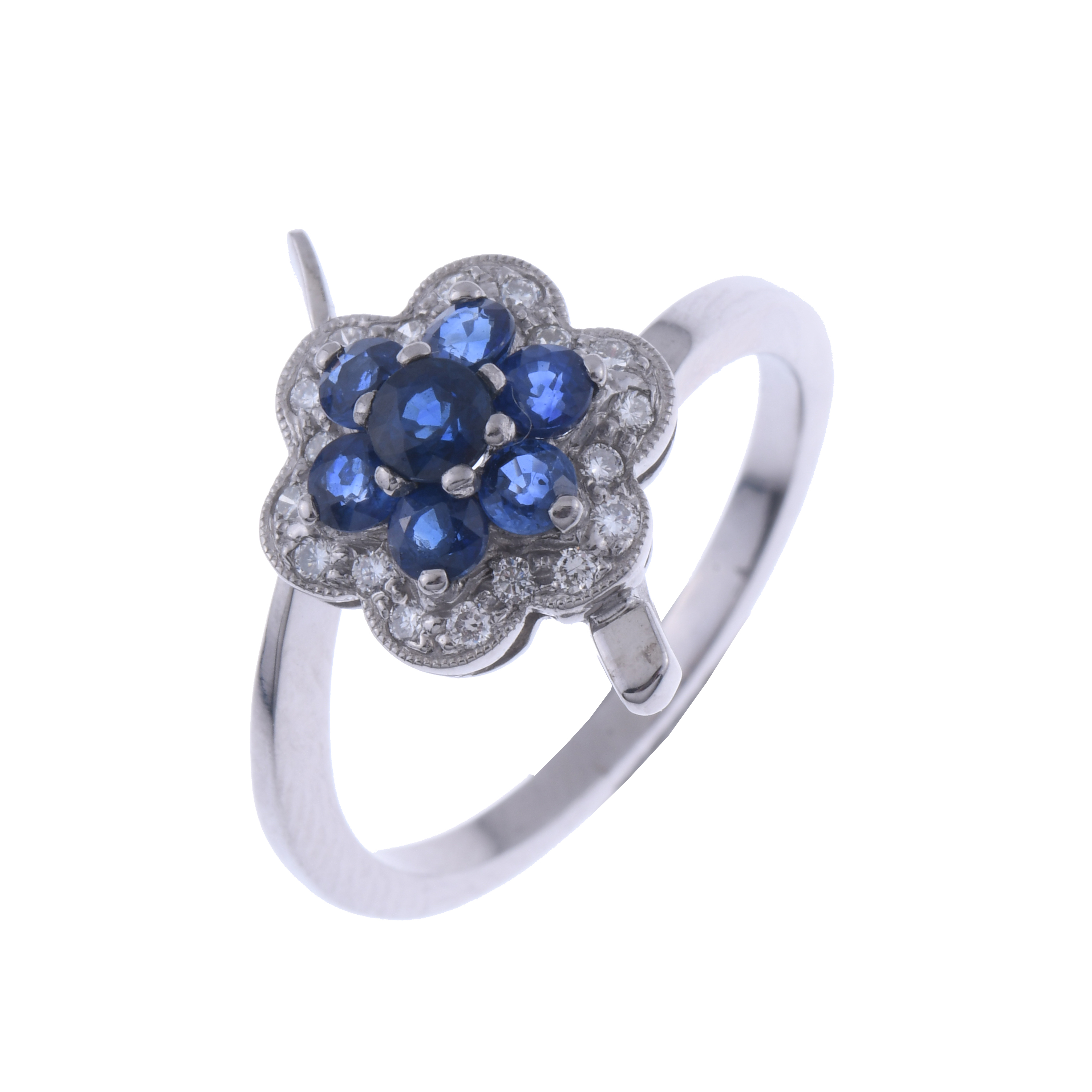 SAPPHIRES AND DIAMONDS FLORAL RING.