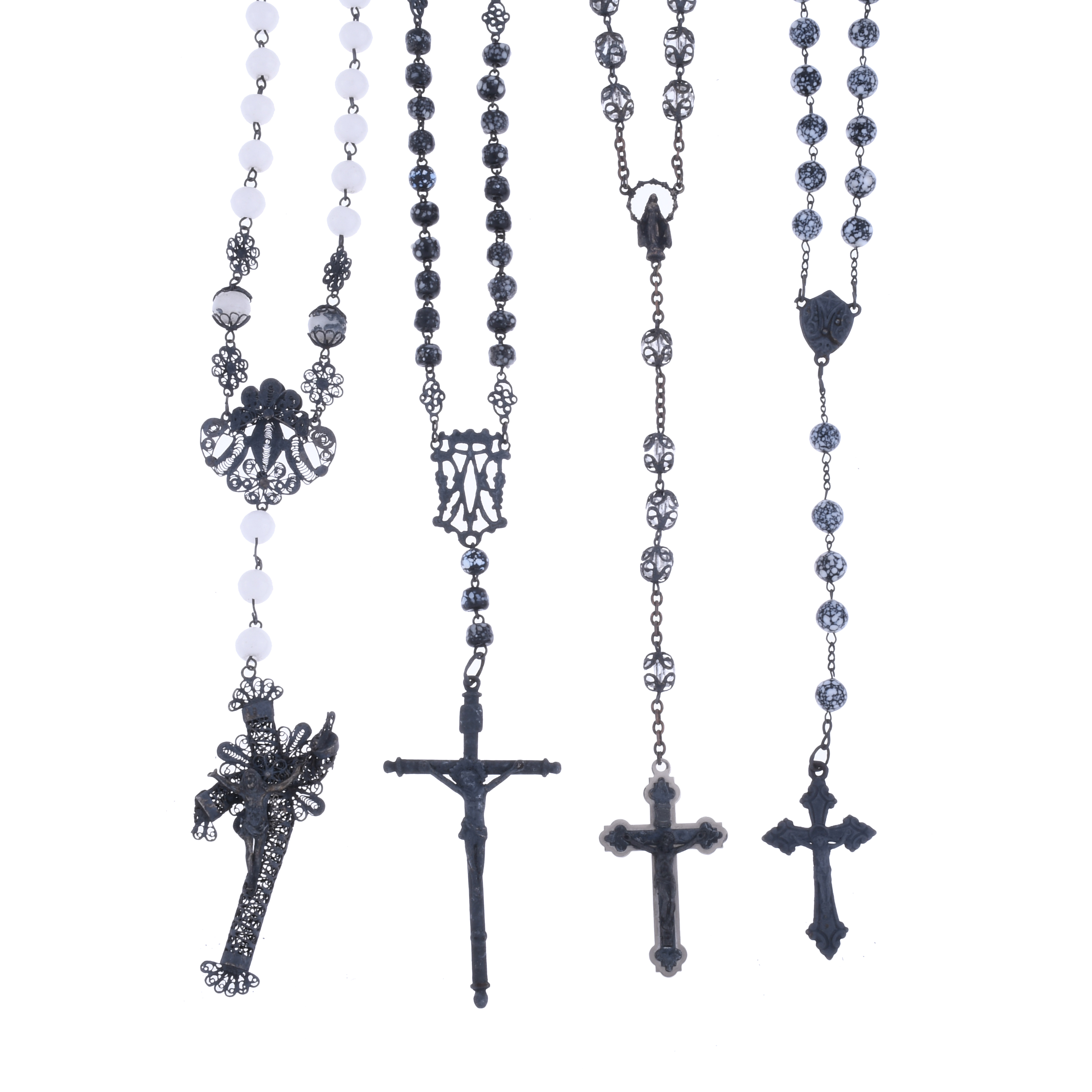 FOUR ROSARIES IN ROCK CRYSTAL, CERAMIC AND GLASS, WITH SILV