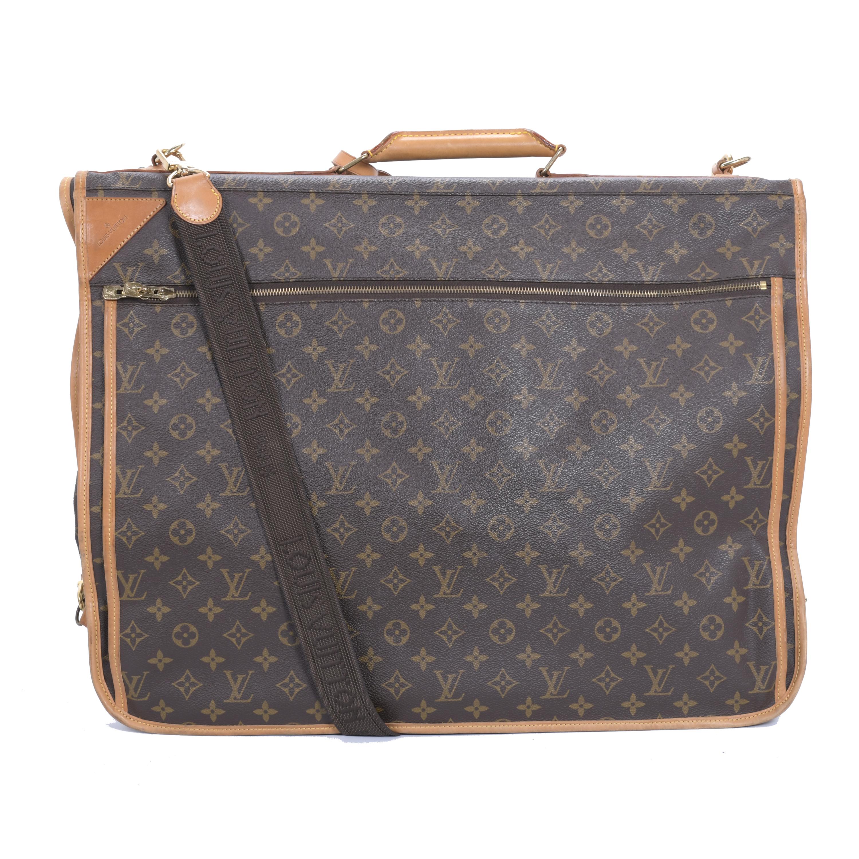 LOUIS VUITTON. SUITCASE, CIRCA 2000.