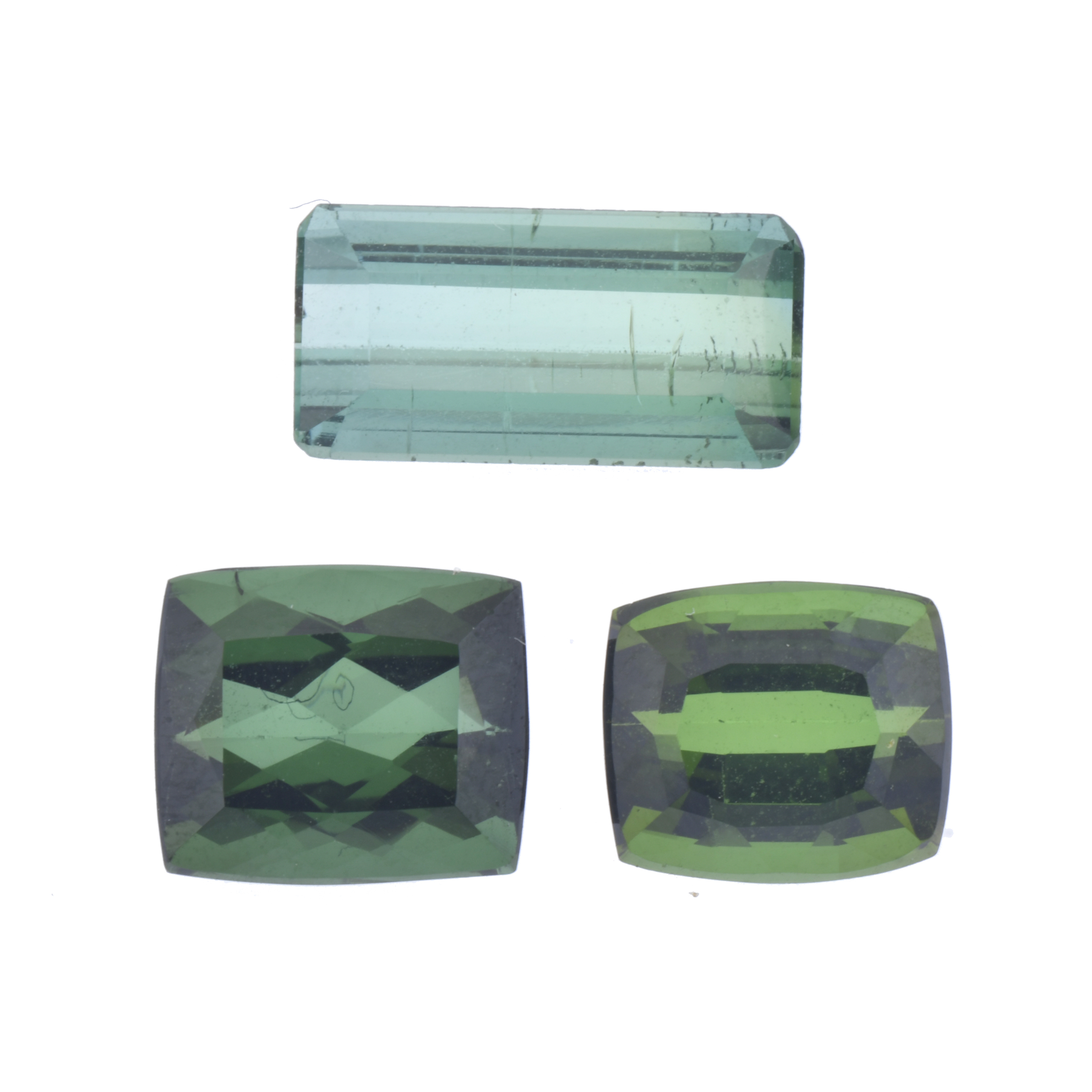 Lot of three unmounted green tourmalines.