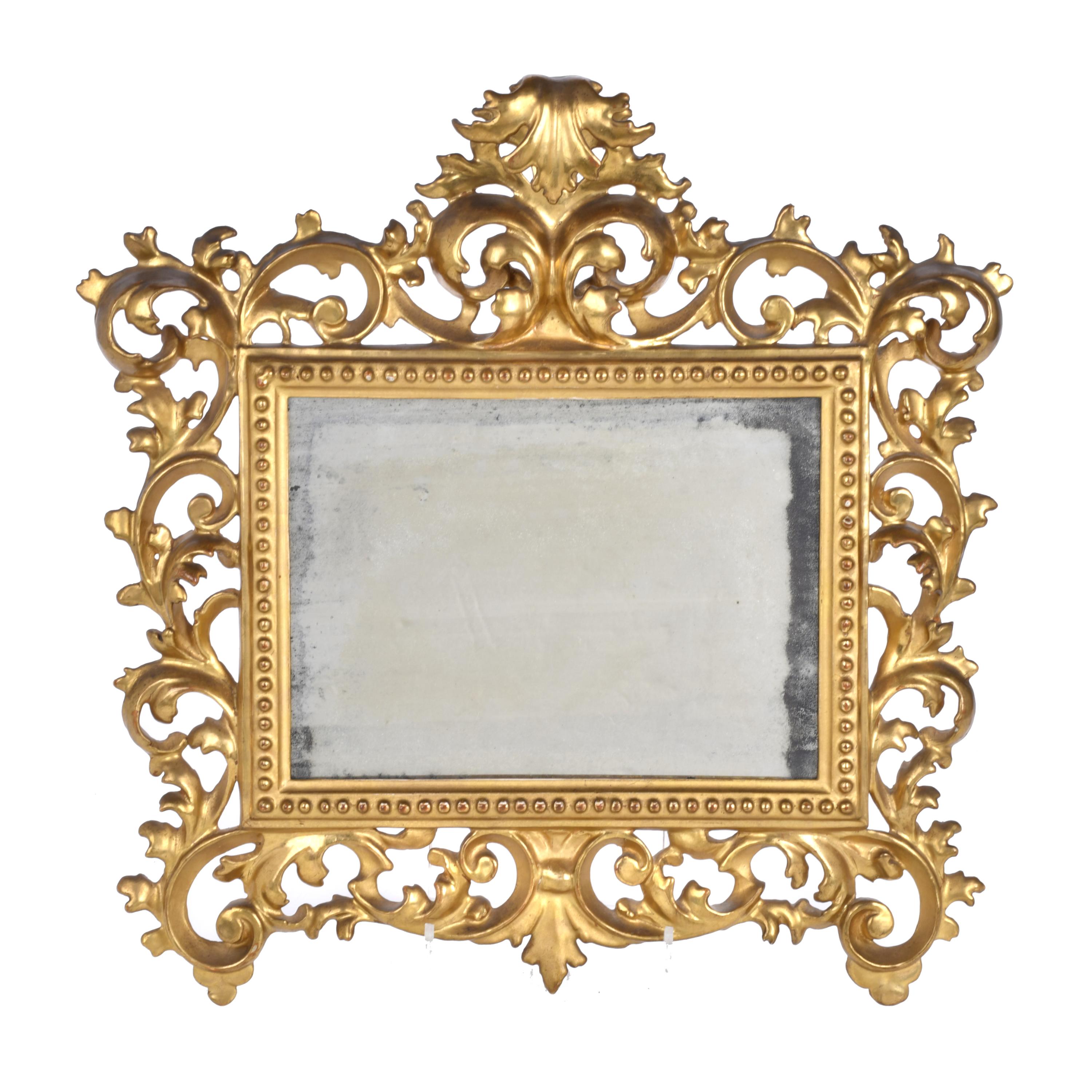 Small Elizabethan style mirror, late 19th century.