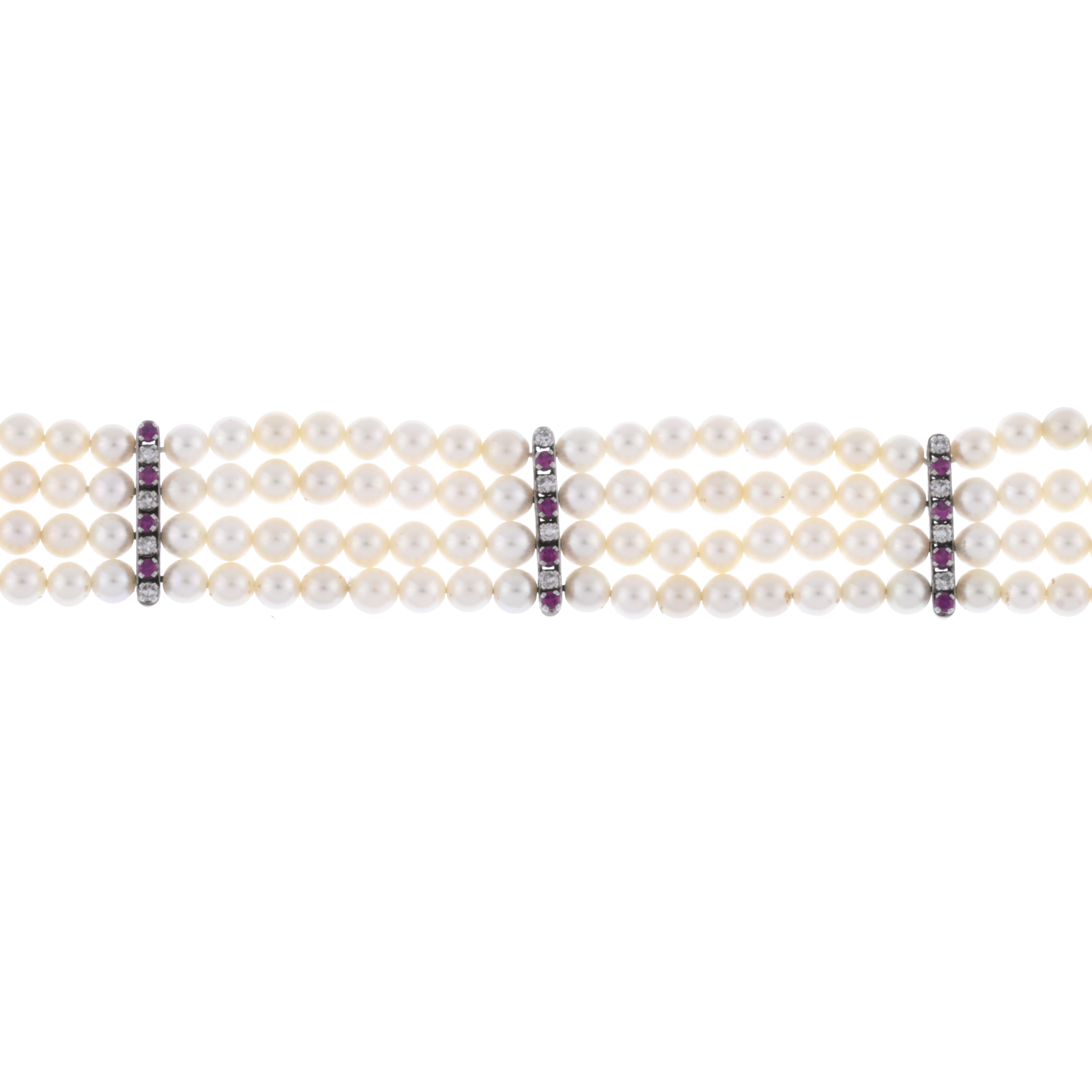 J. ROCA. Pulsera de cuatro hilos de perlas rubíes y diamant