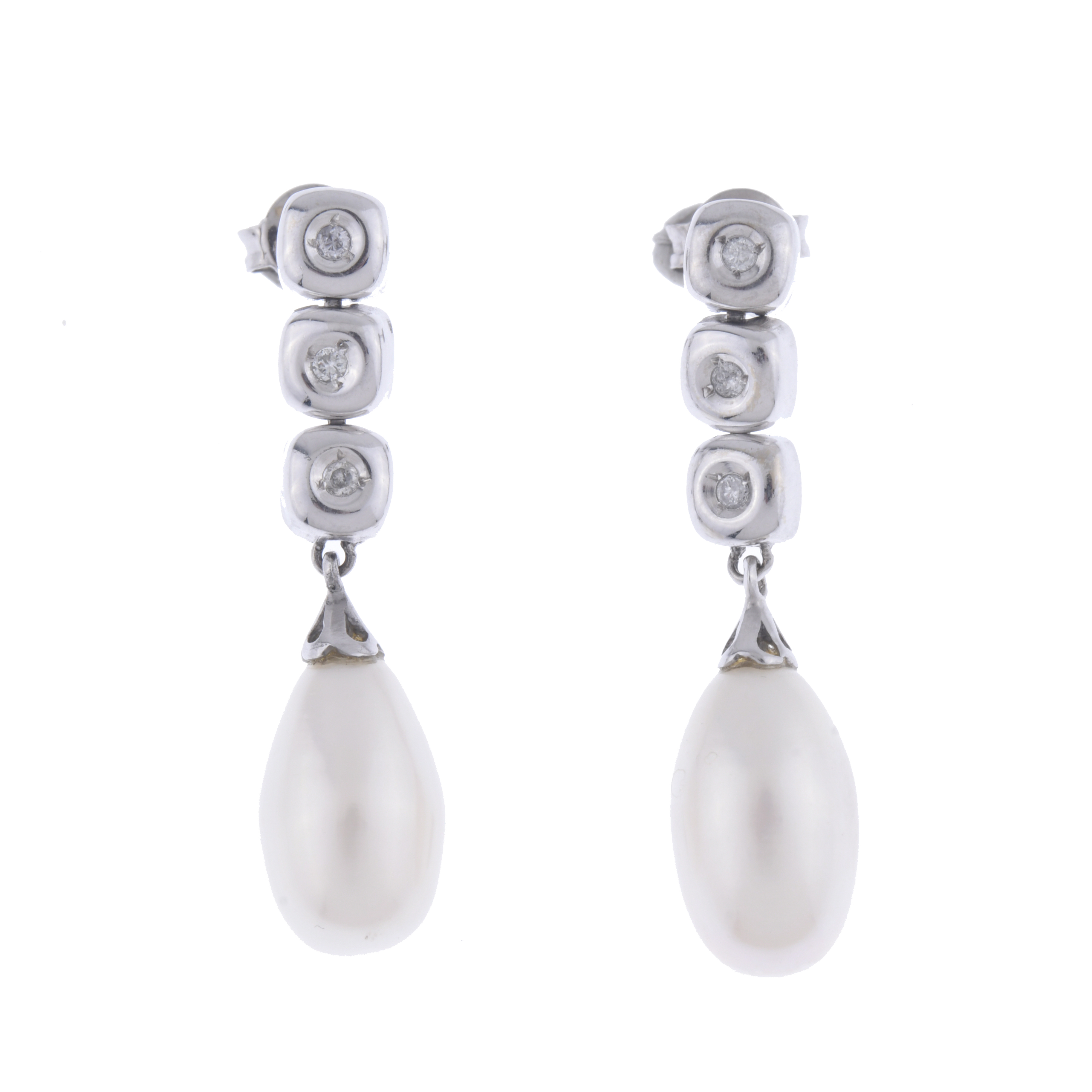 Long earrings with pearls and diamonds.