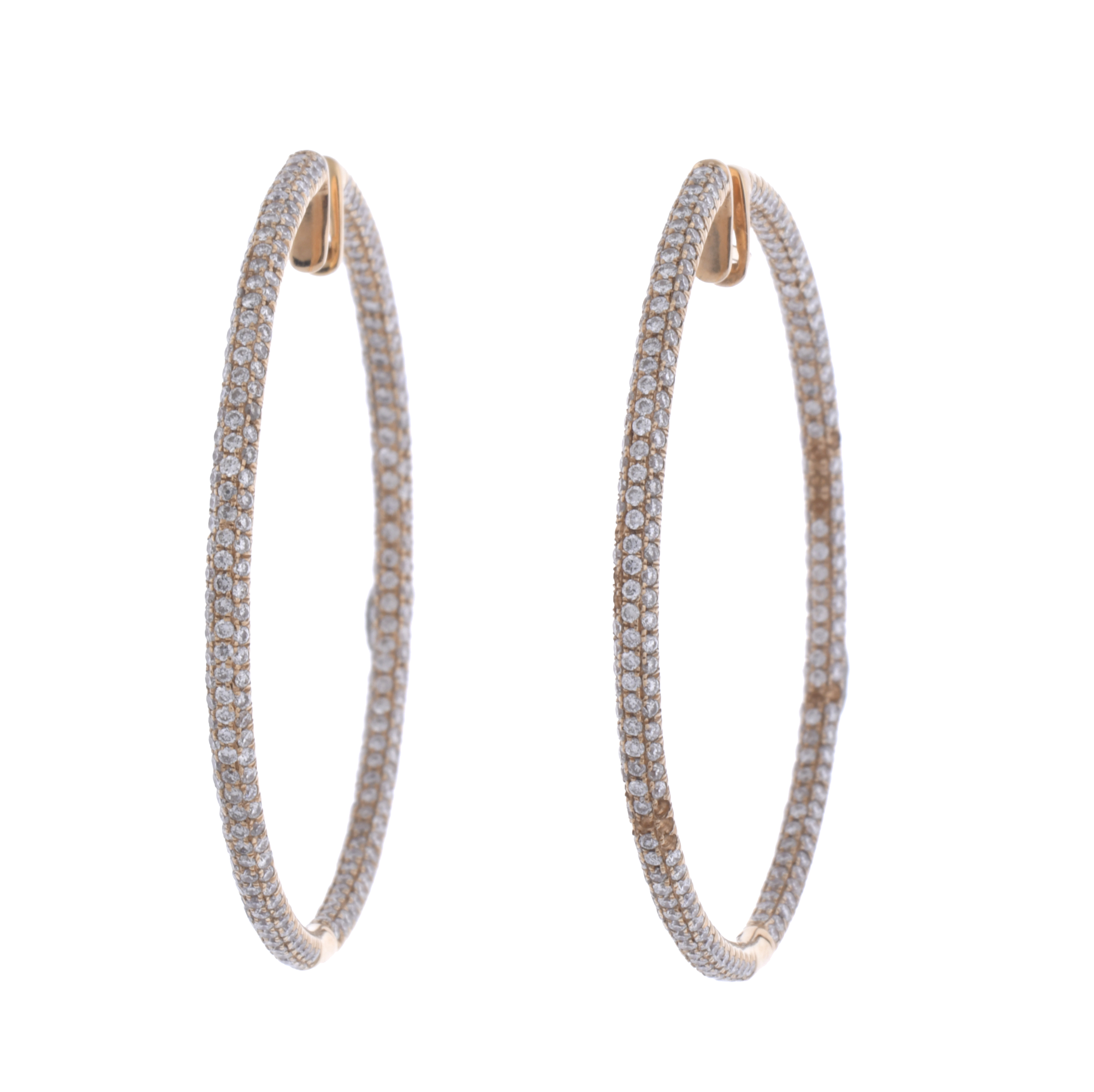 Hoop earrings with diamonds.