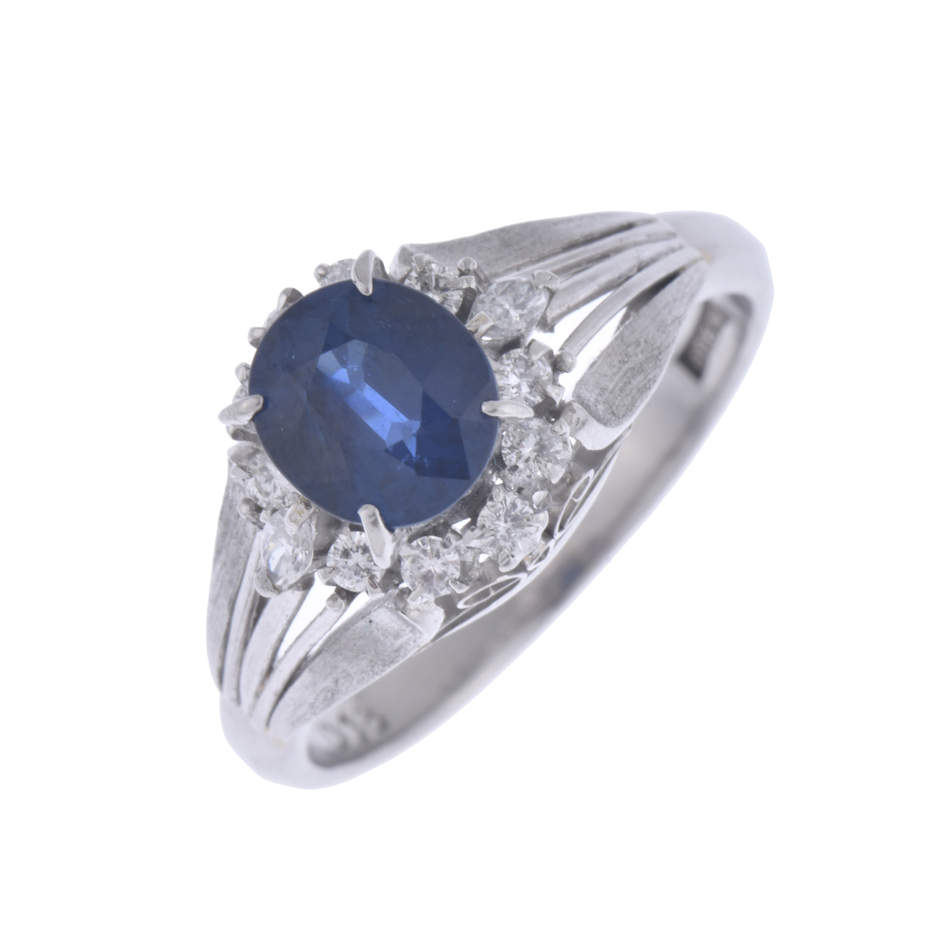 Art Deco style ring with sapphire and diamonds rosette.