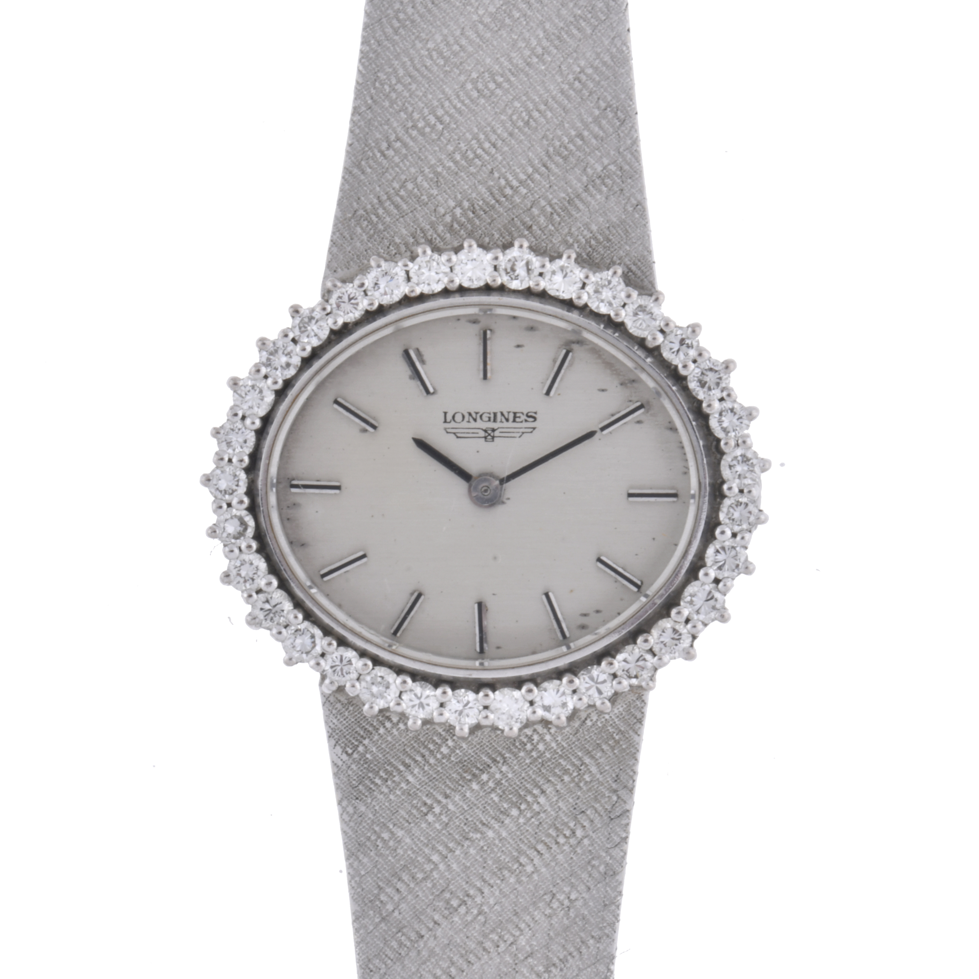 LONGINES. Reloj - joya en oro blanco y diamantes.
