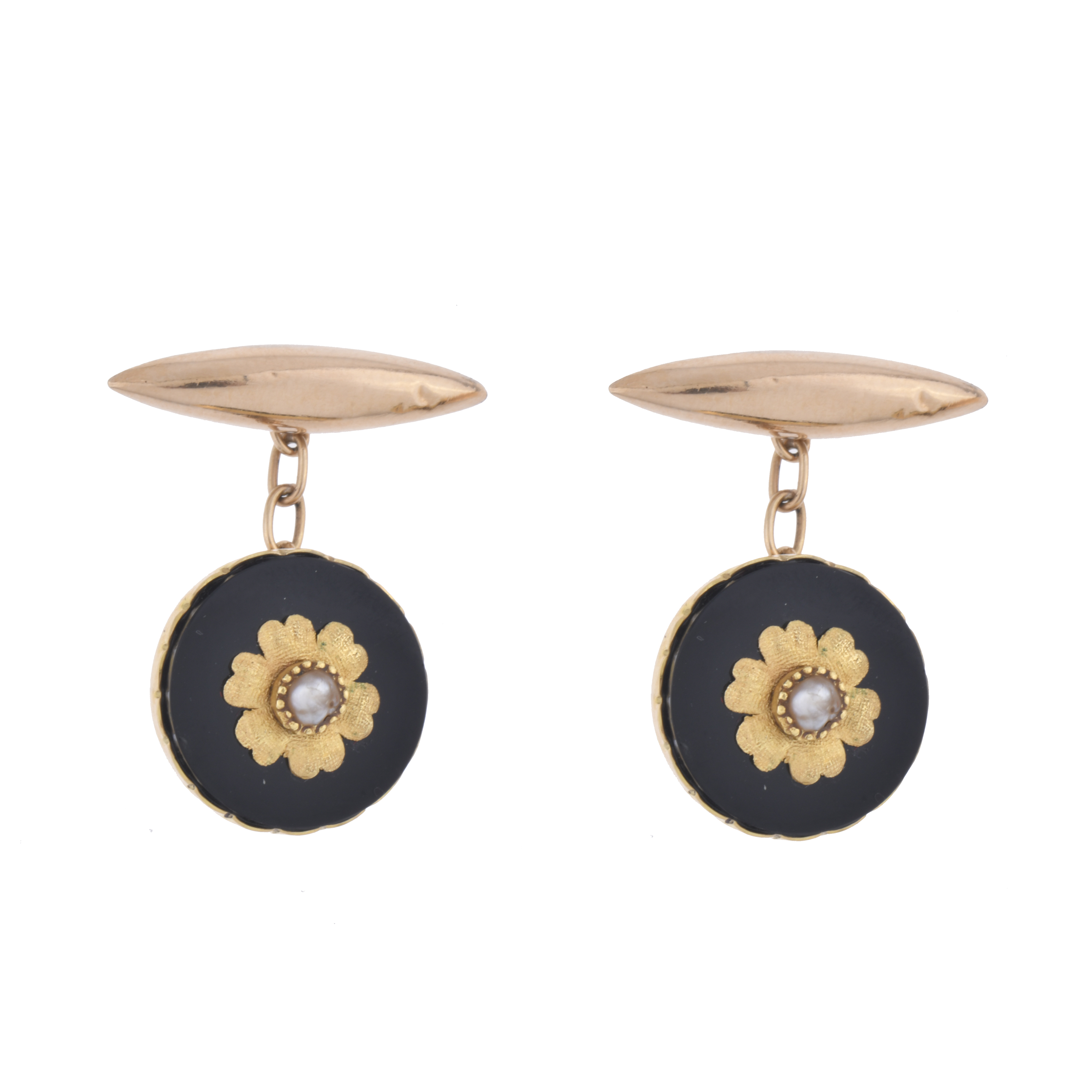 Gemelos en oro, ónix y perlas. 