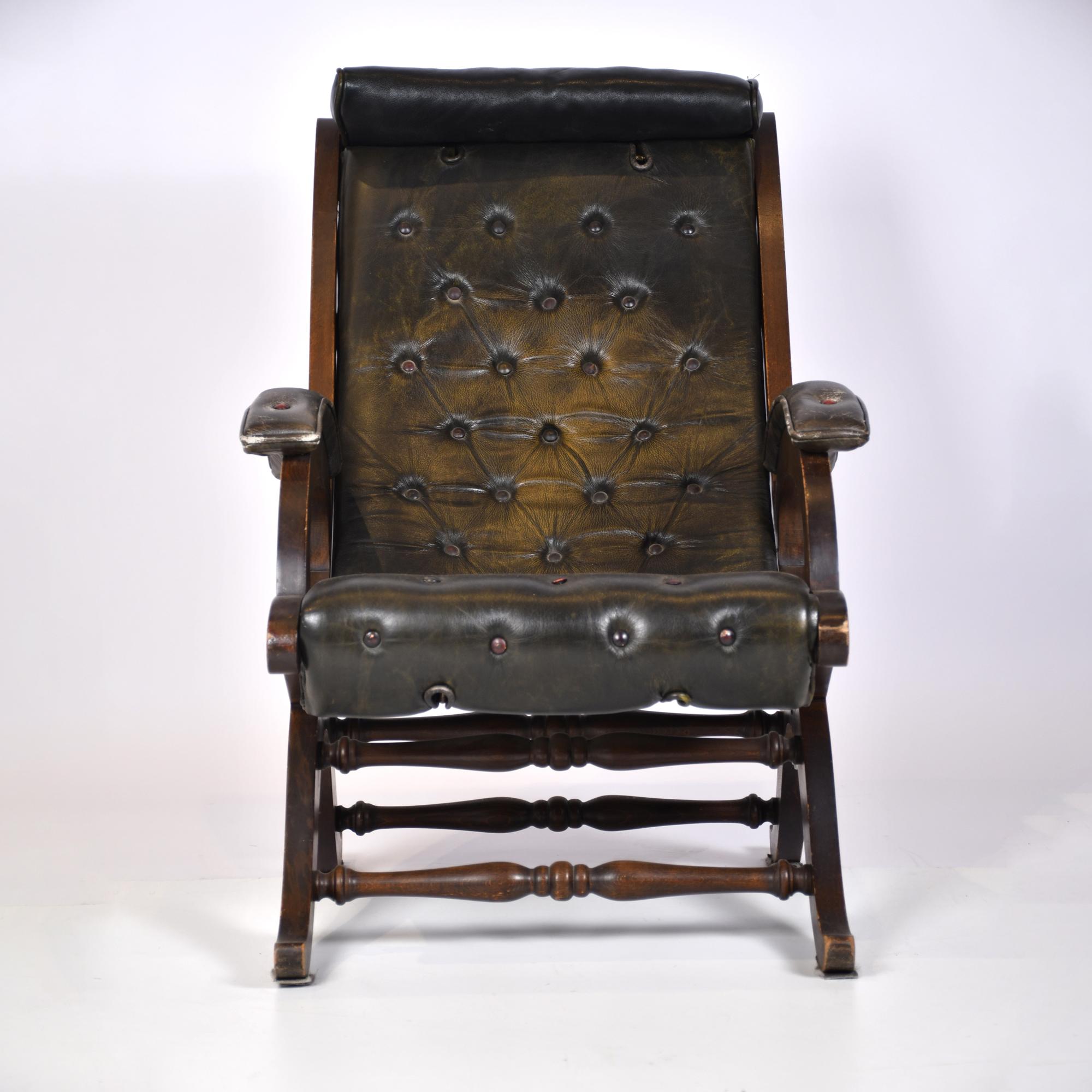 VALENTÍ. Leather armchair with ottoman, mid 20th century.