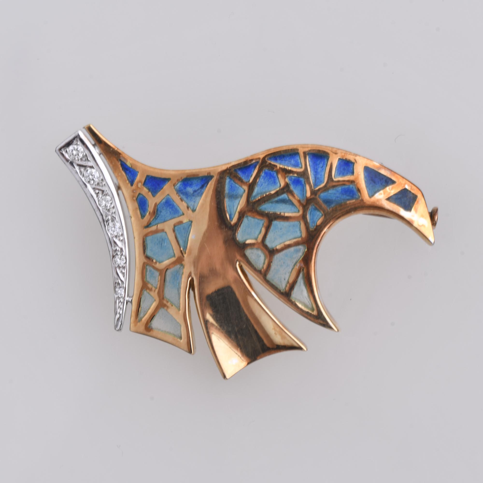 Brooch with glazed enamel and diamonds.