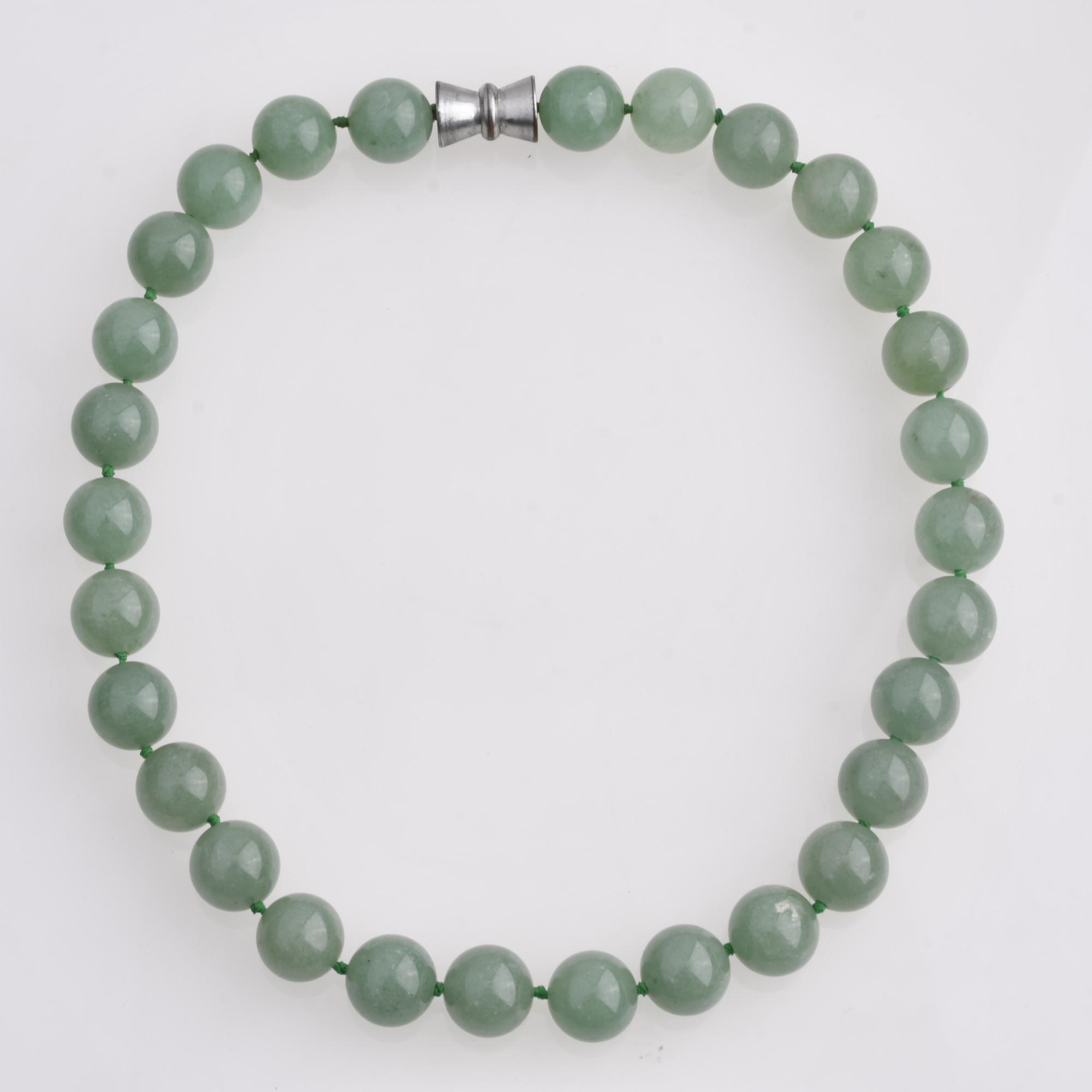 Jade bead necklace.