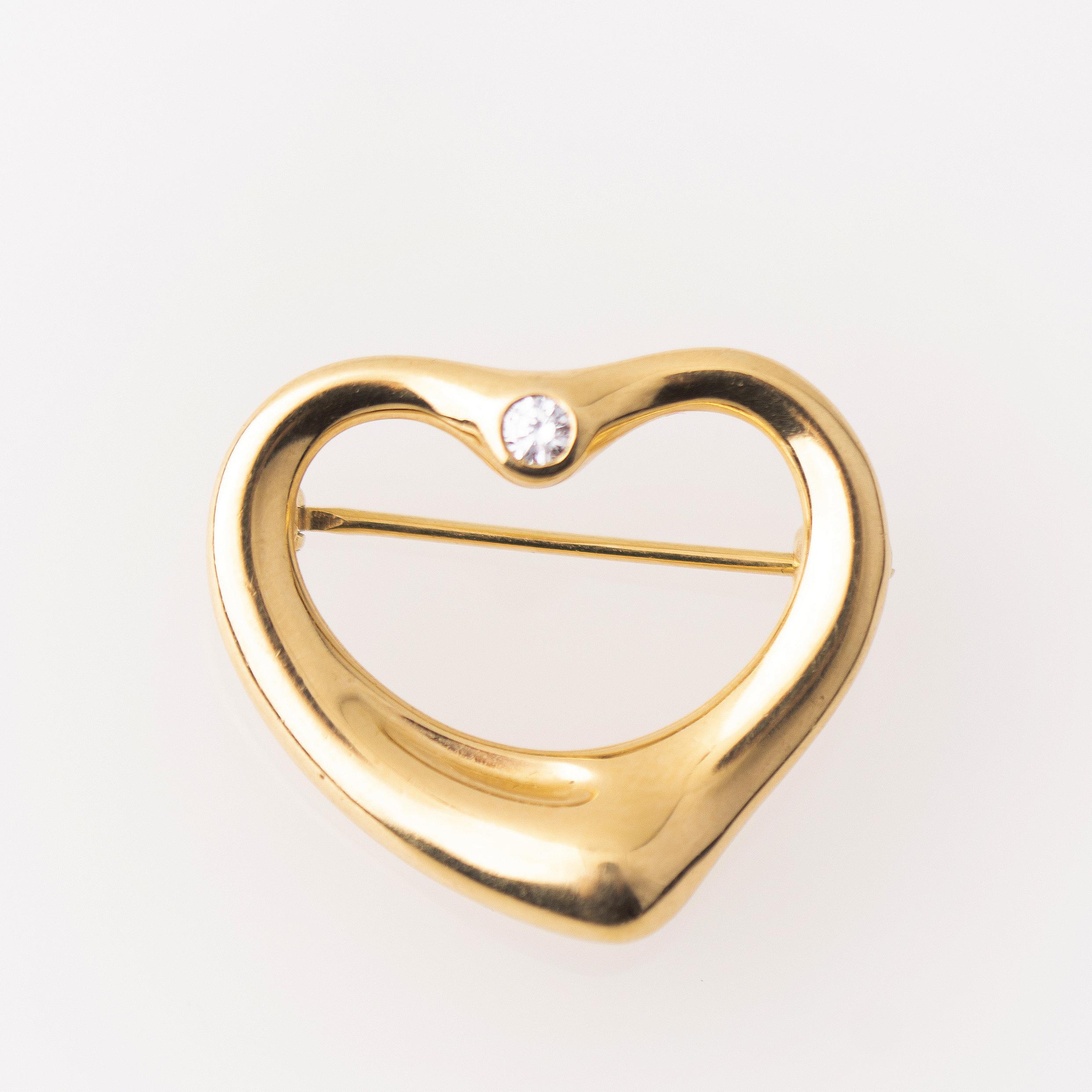 Tiffany&#39;s Elsa Peretti heart-shaped diamond brooch.