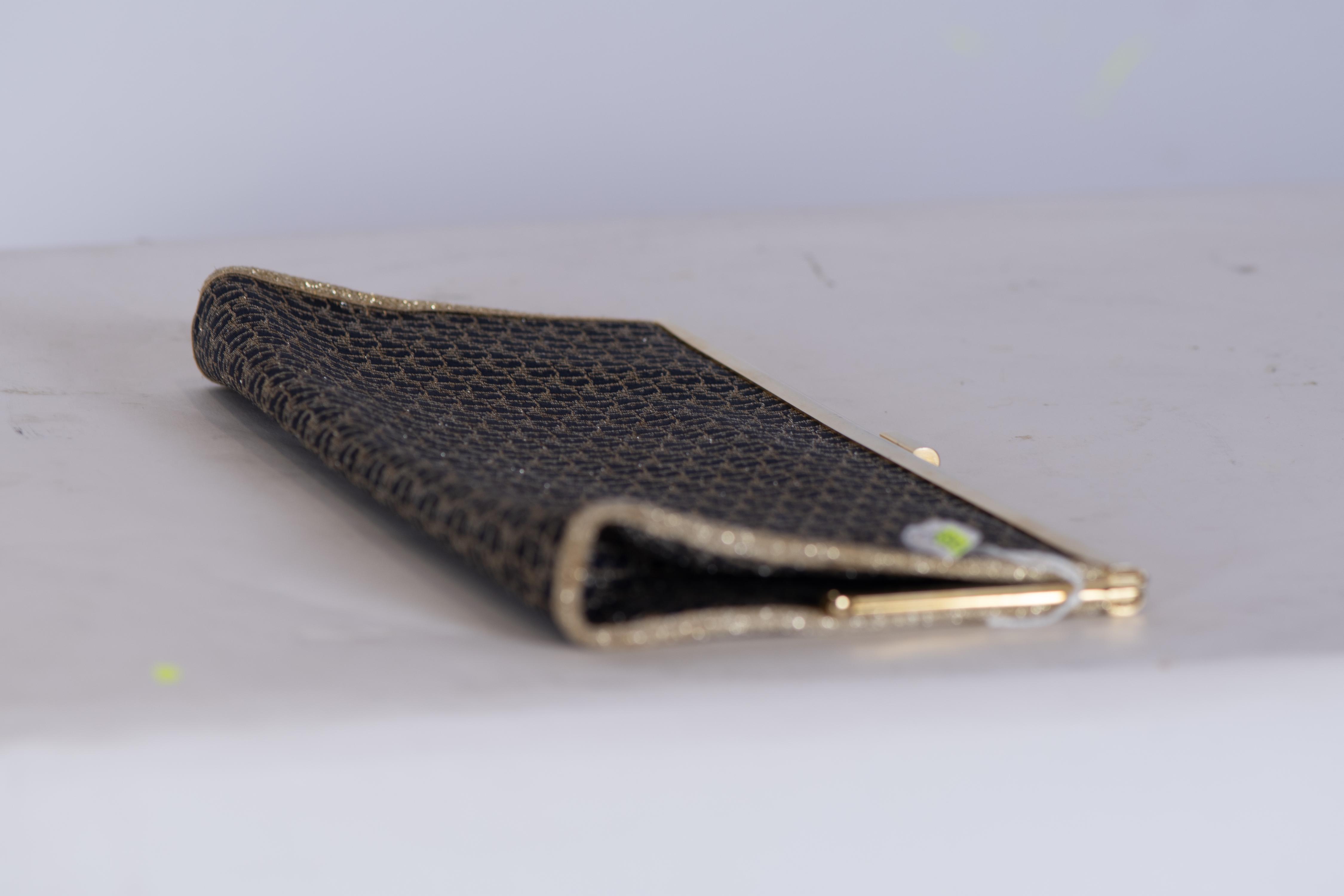 DIOR. Clutch bag.