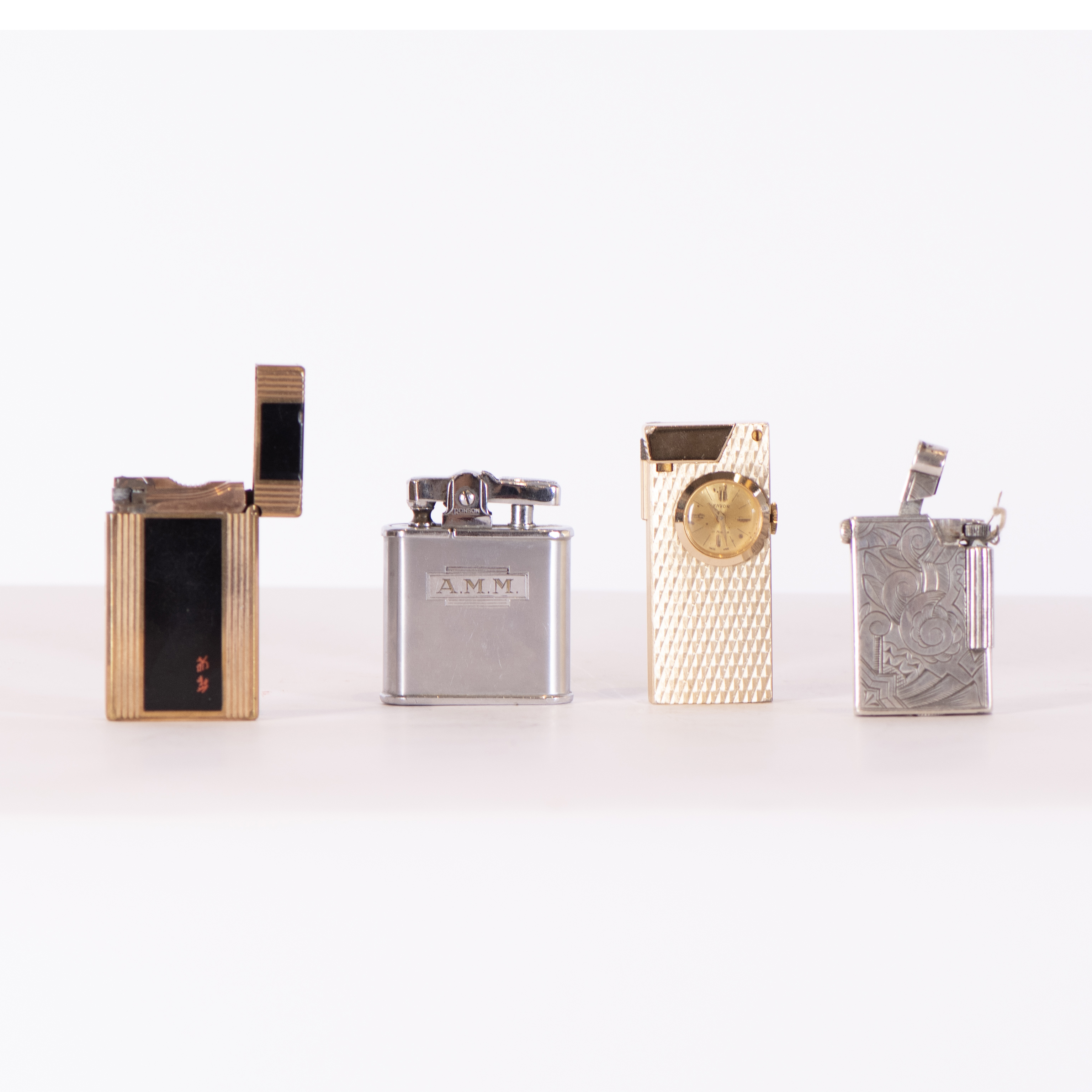Set of four lighters.