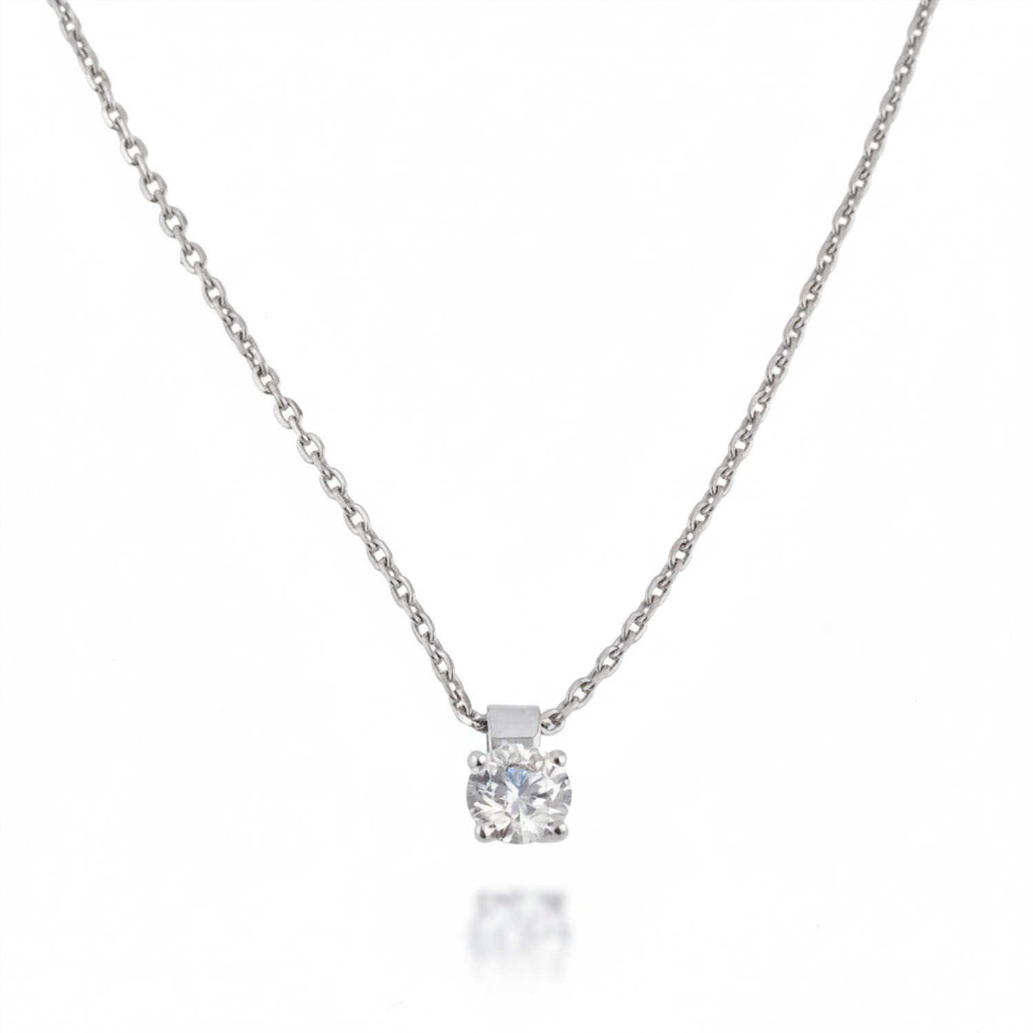Pendant with diamond set in a clasp-shaped mount.