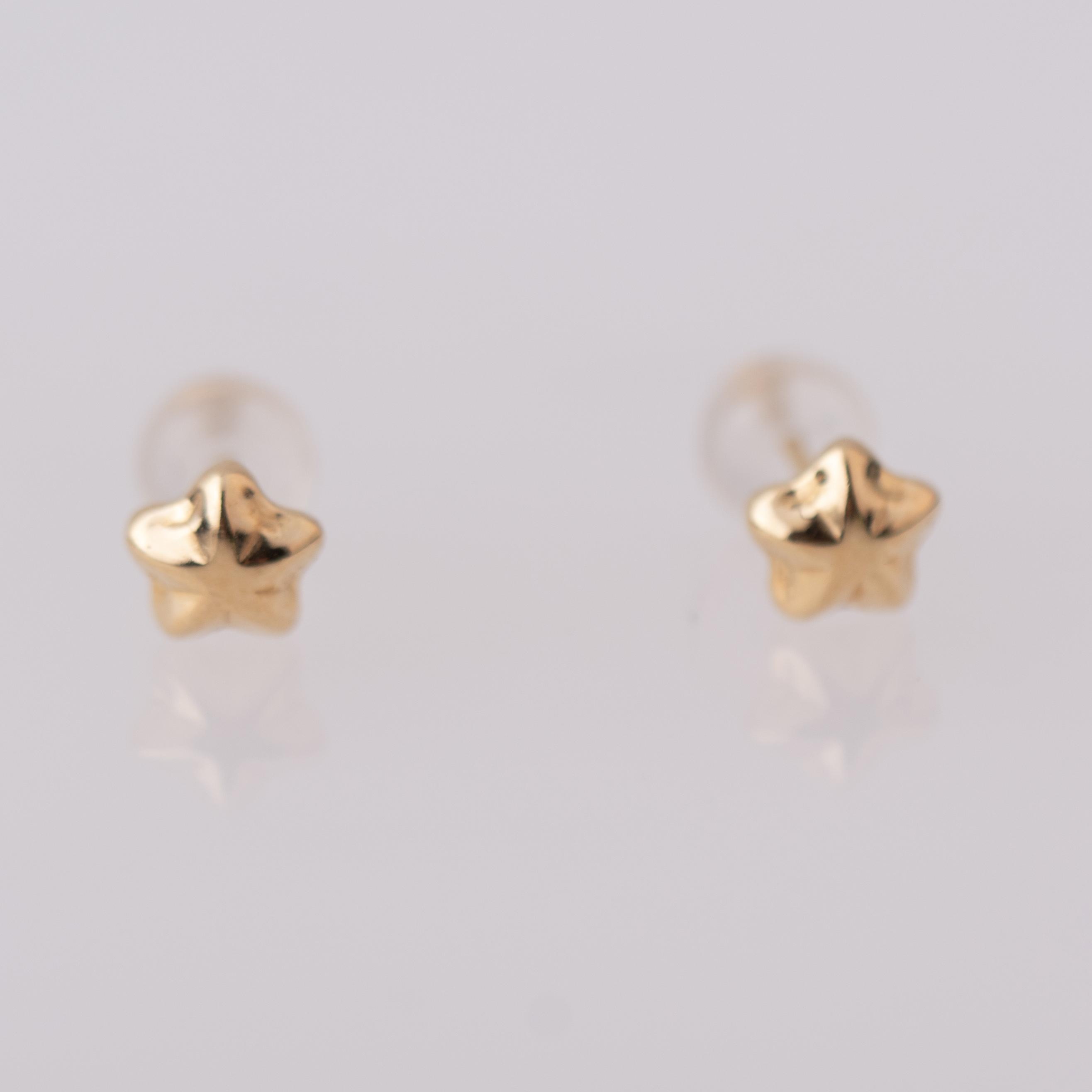 Star-shaped earrings.