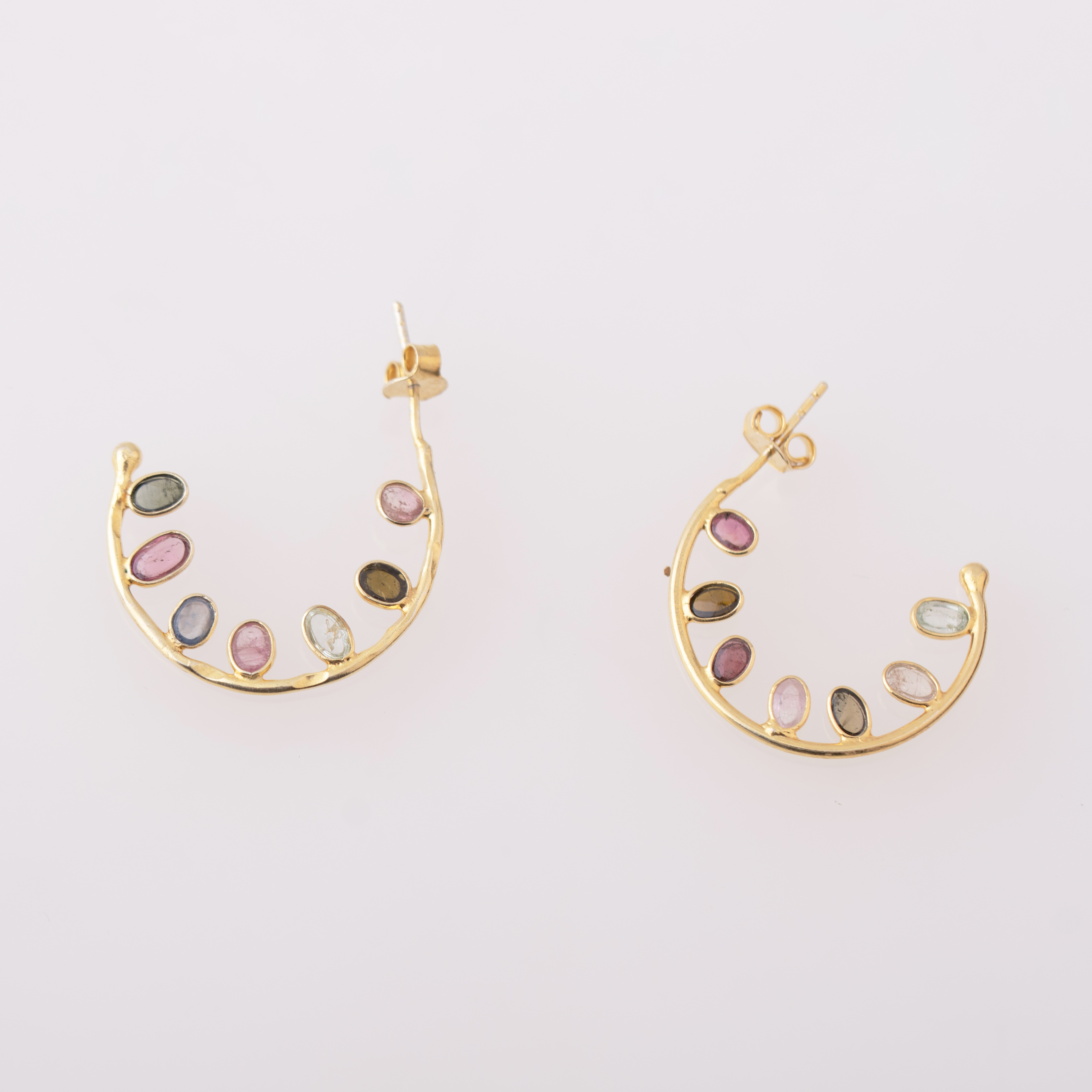 Half-circle earrings.