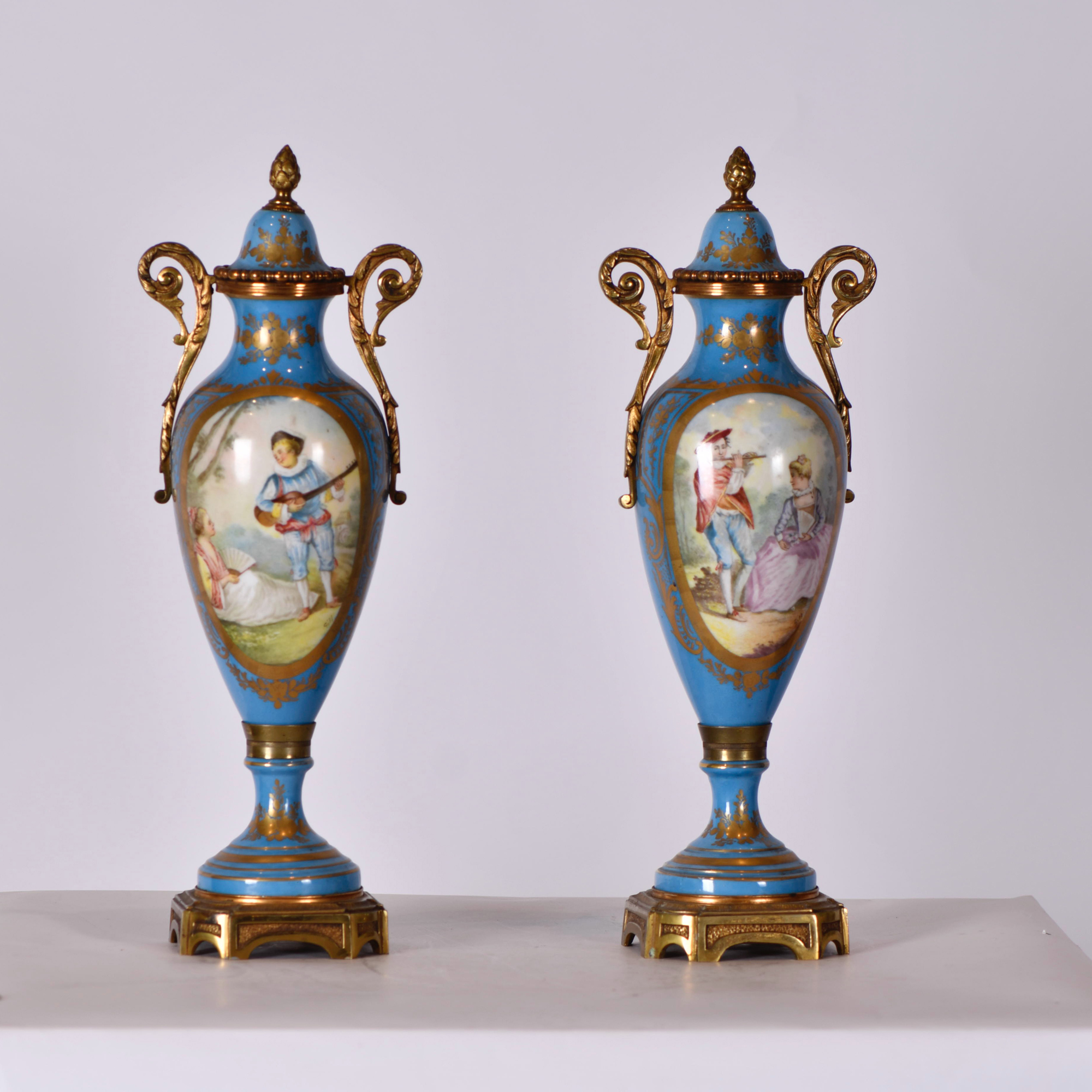 AFTER SEVRES MODELS, pair of urns, 20th century.