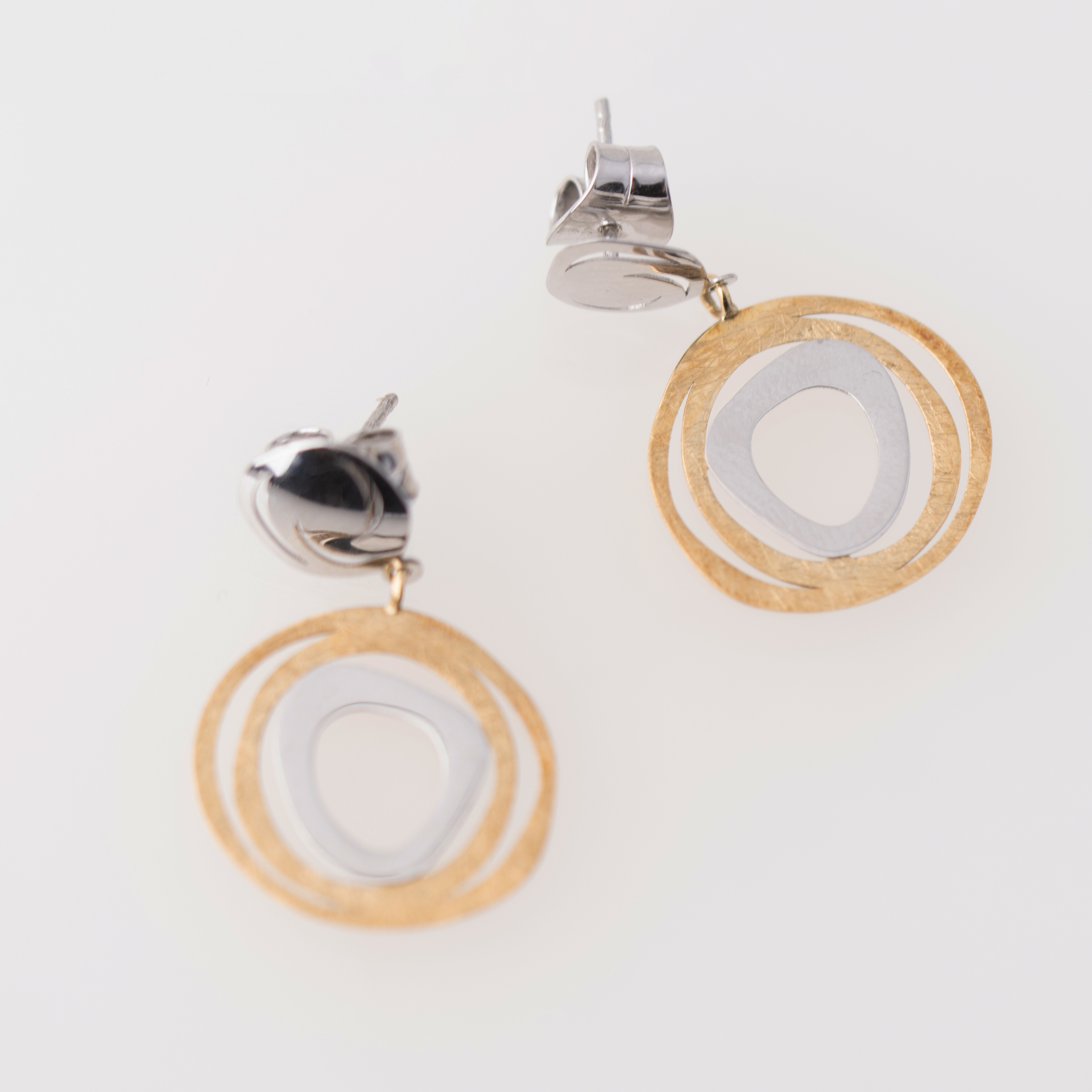 Earrings with organic shapes.