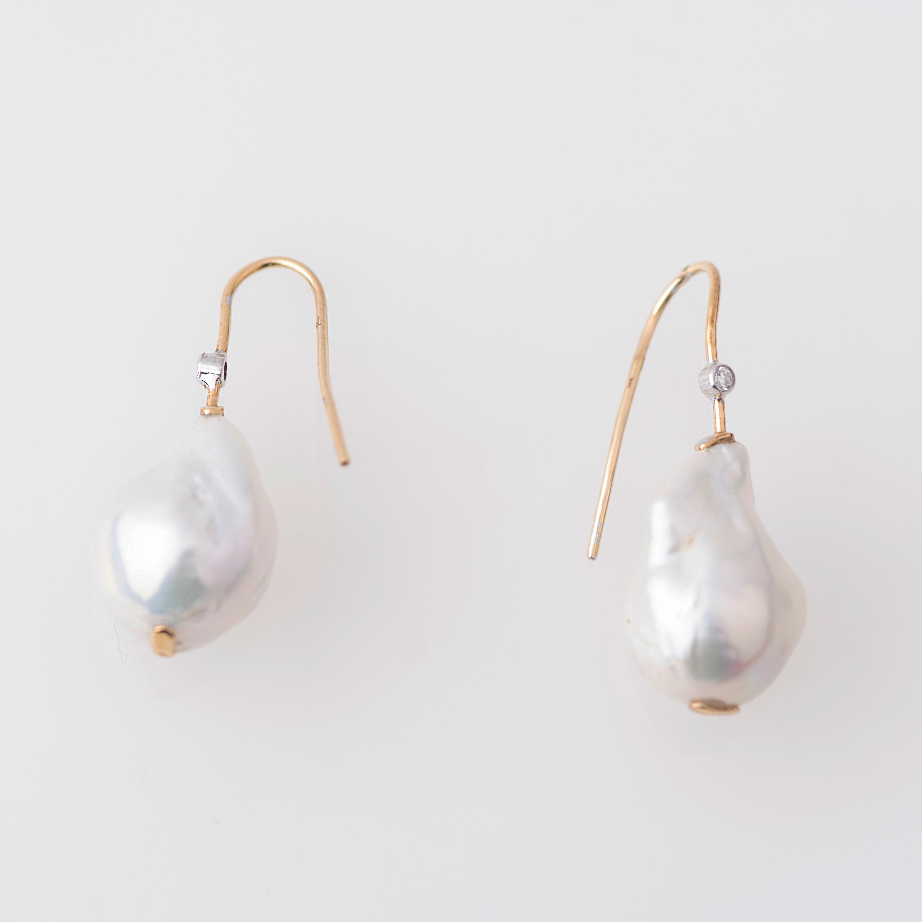 Earrings with Baroque pearls.