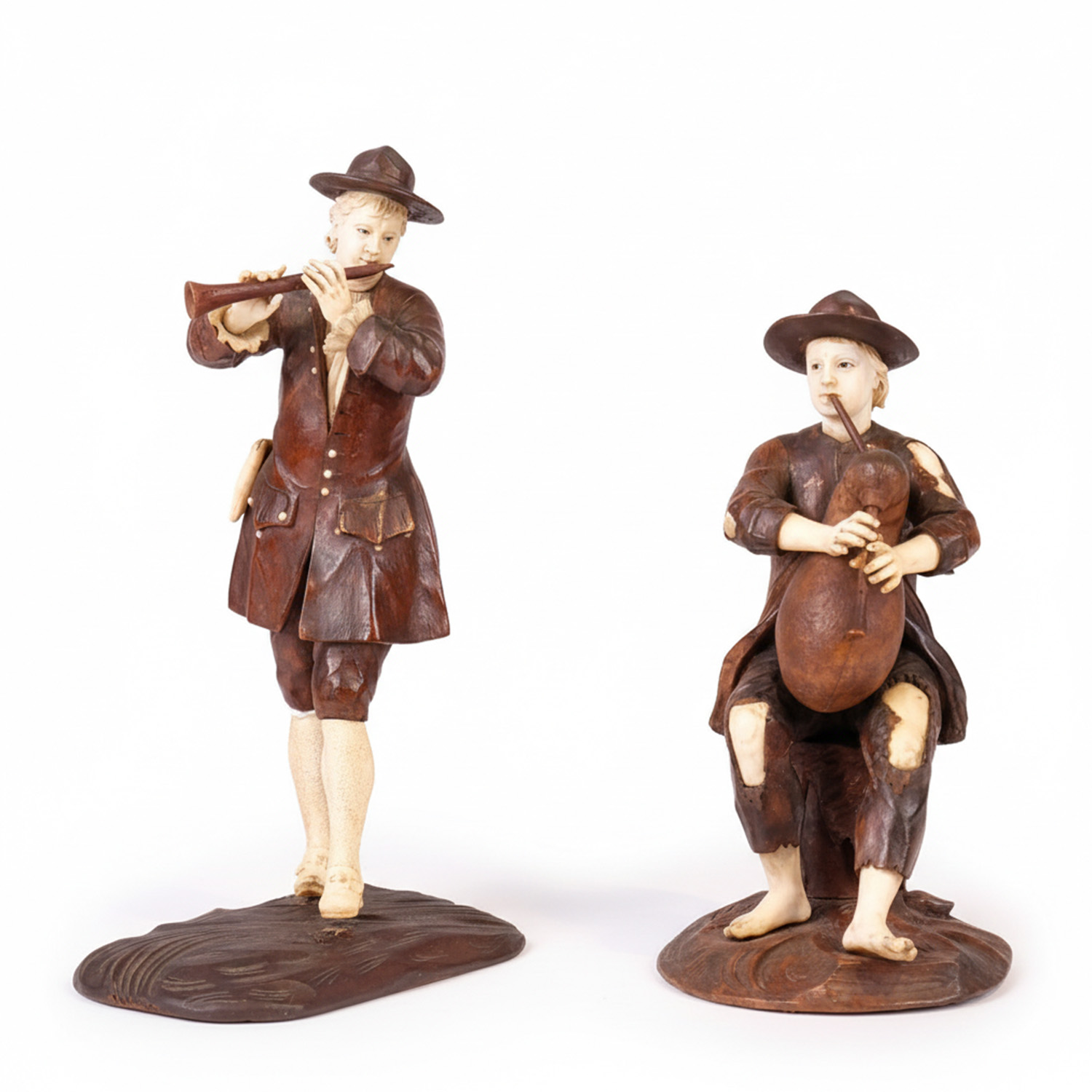 AFTER 17TH-CENTURY GERMAN MODELS, pair of musicians, 19th c