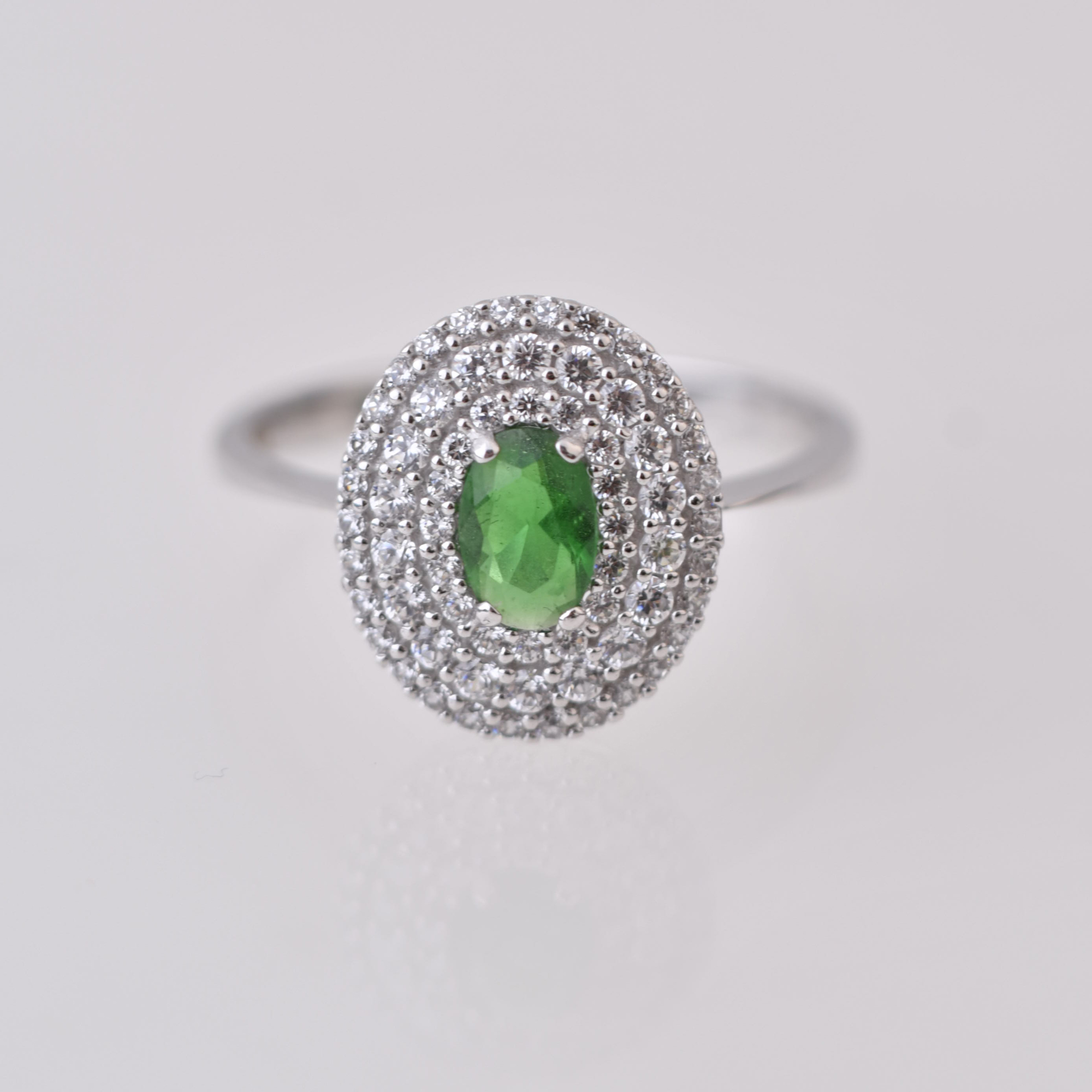 Rosette ring with emerald and diamonds