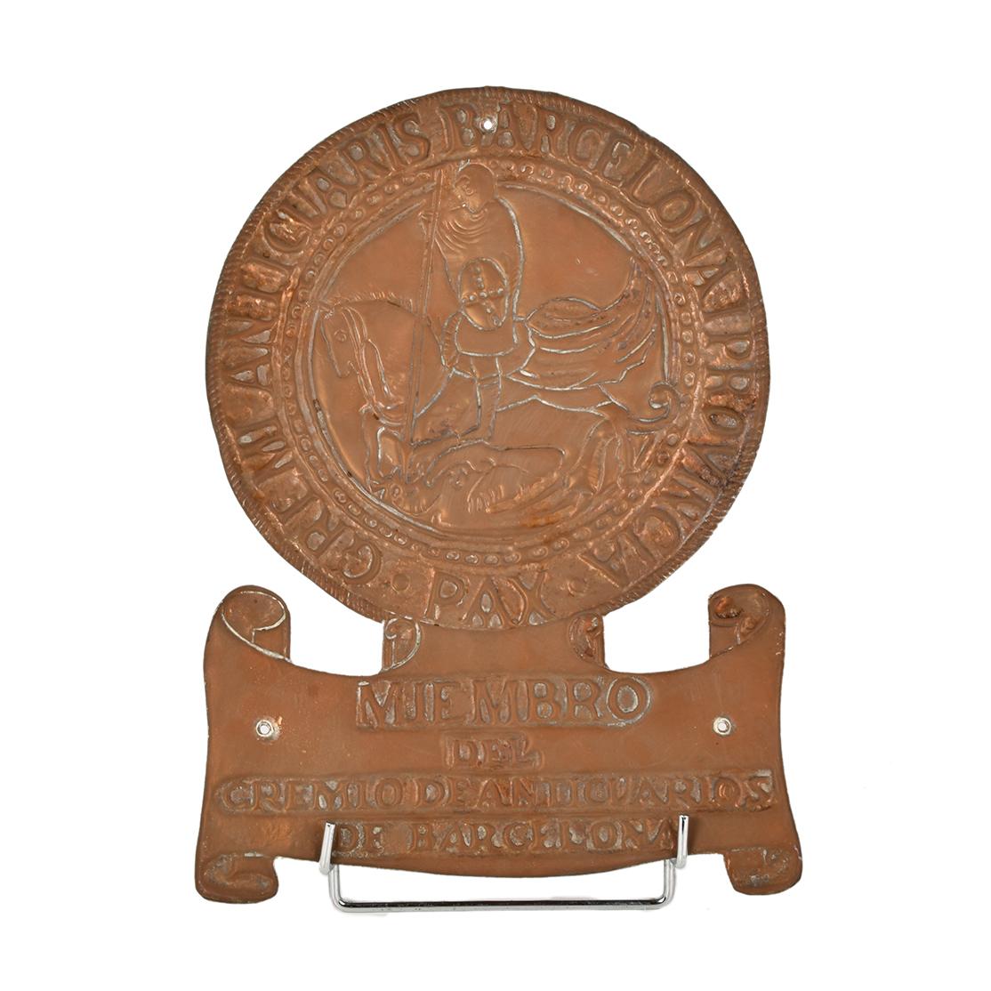 Placa del gremio de anticuarios de Barcelona