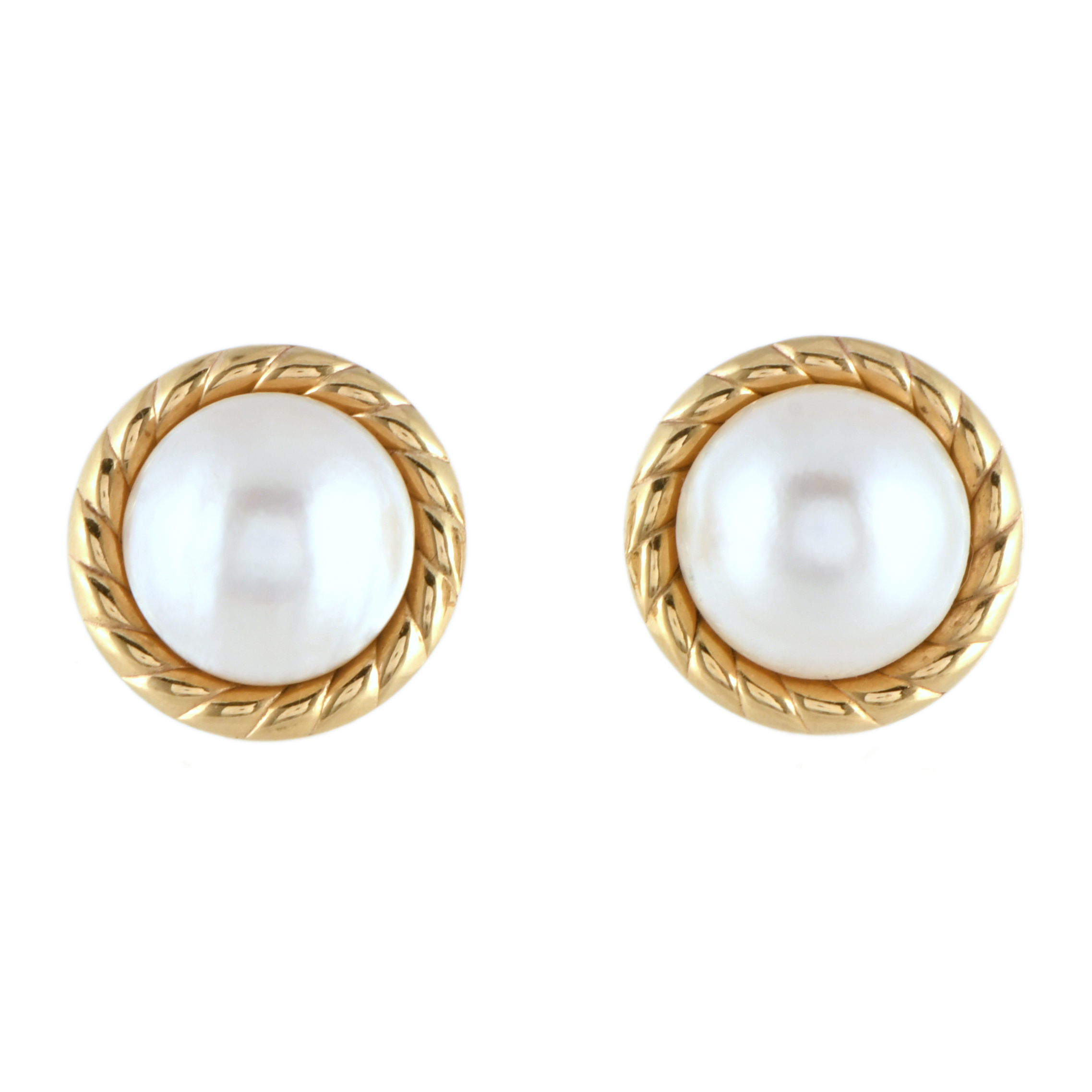 Pendientes con perla mabé.