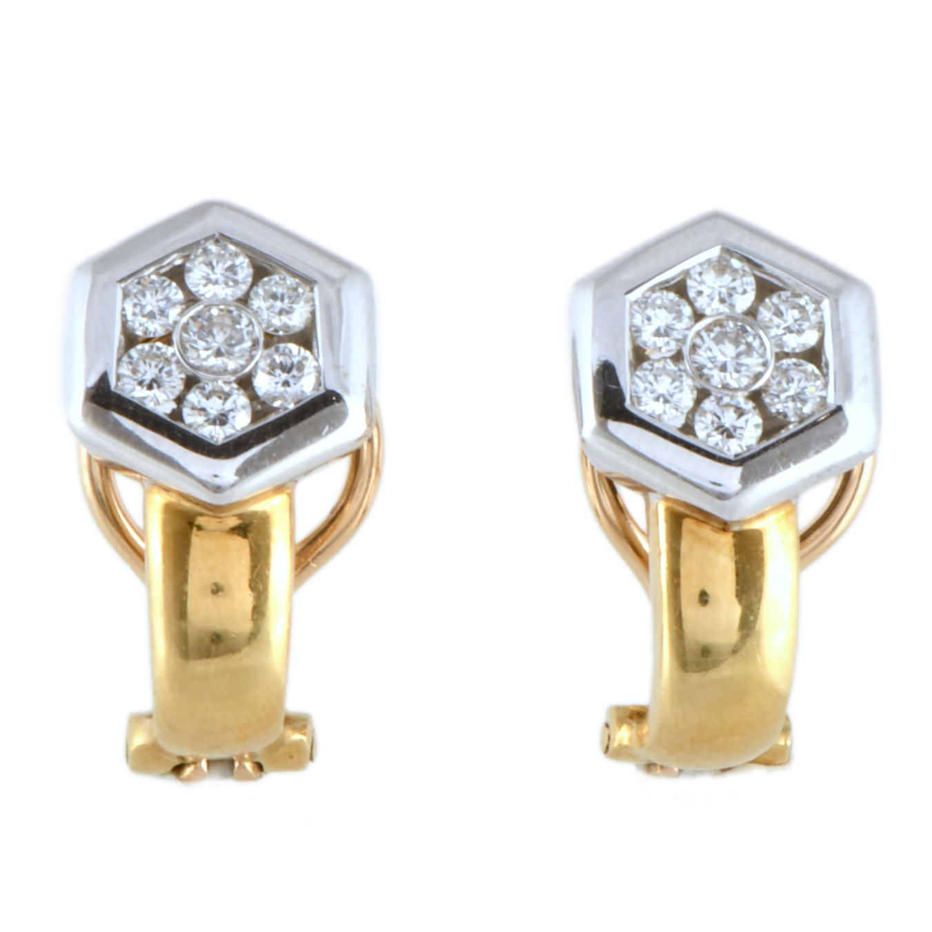 Pendientes en forma hexagonal con diamantes.