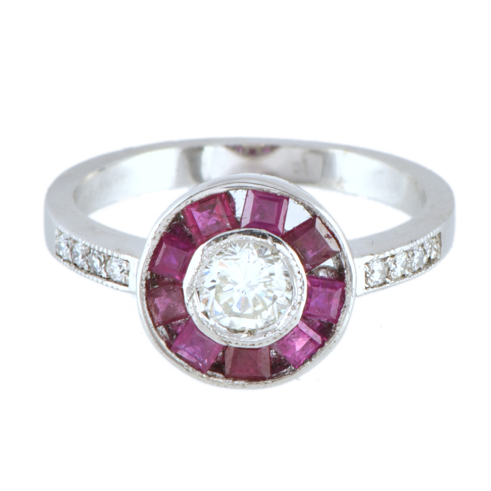 Anillo ojo de perdiz con diamante y rosetón de rubíes. 