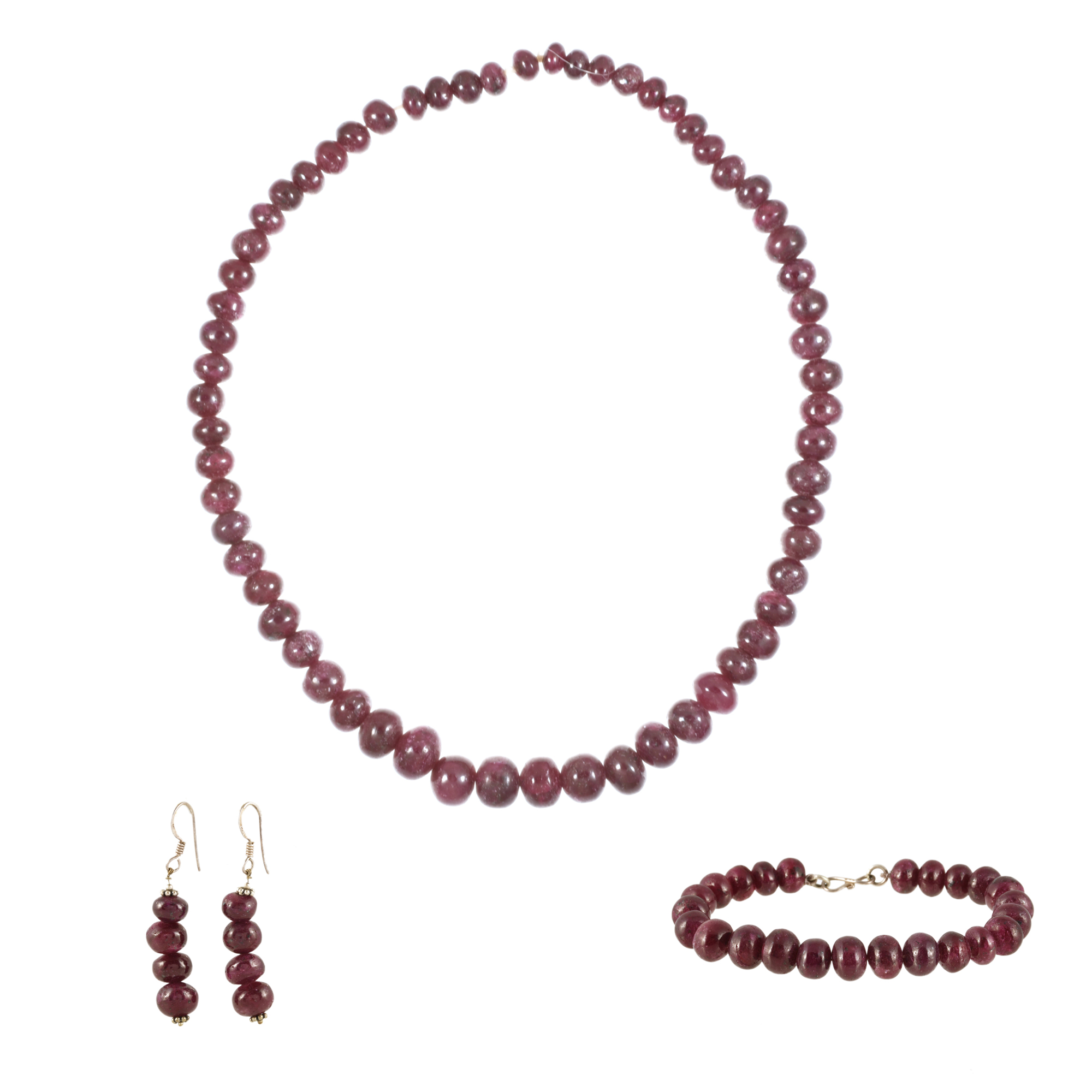 Conjunto de collar, pulsera y pendientes de rubies.