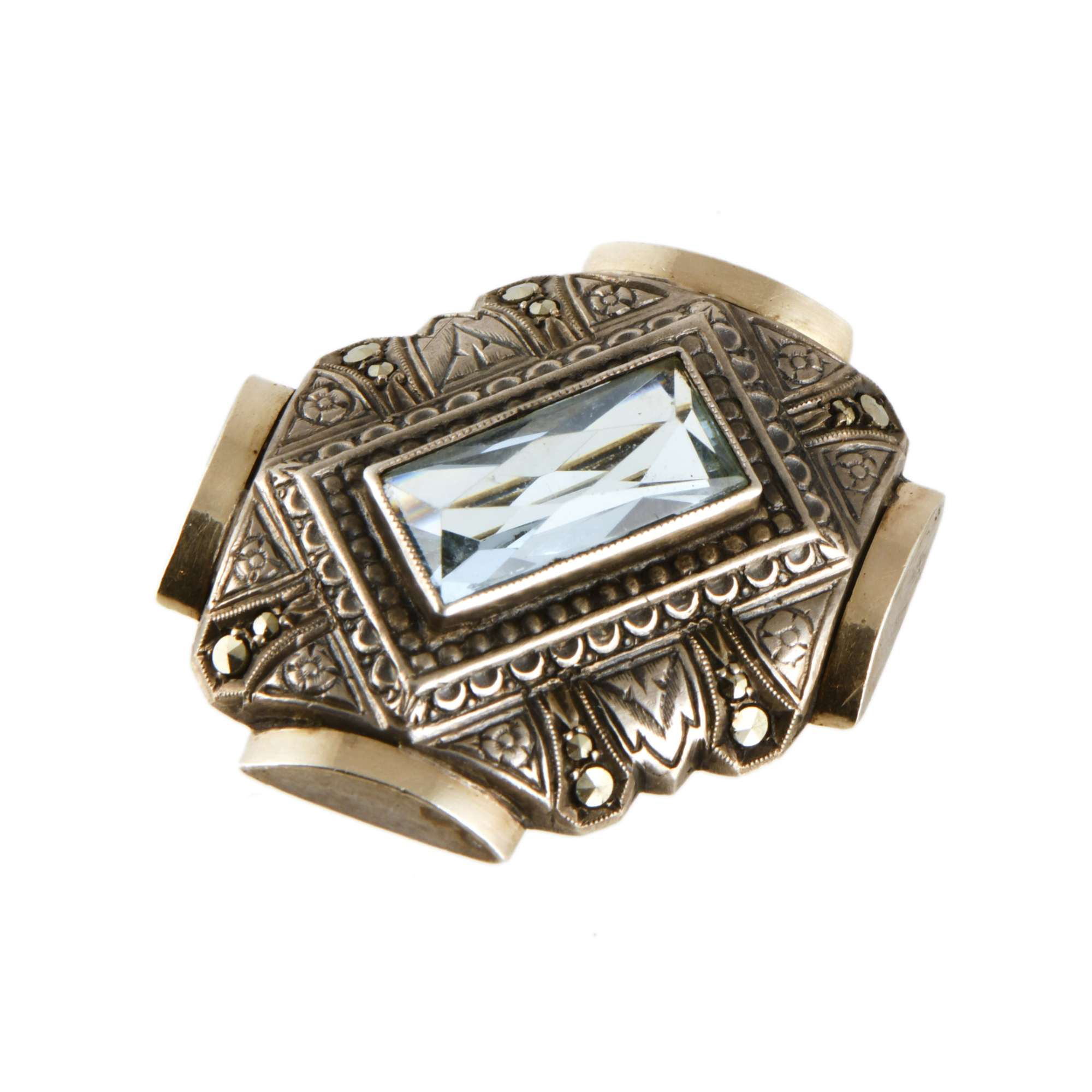 Broche art déco con piedra color aguamarina.