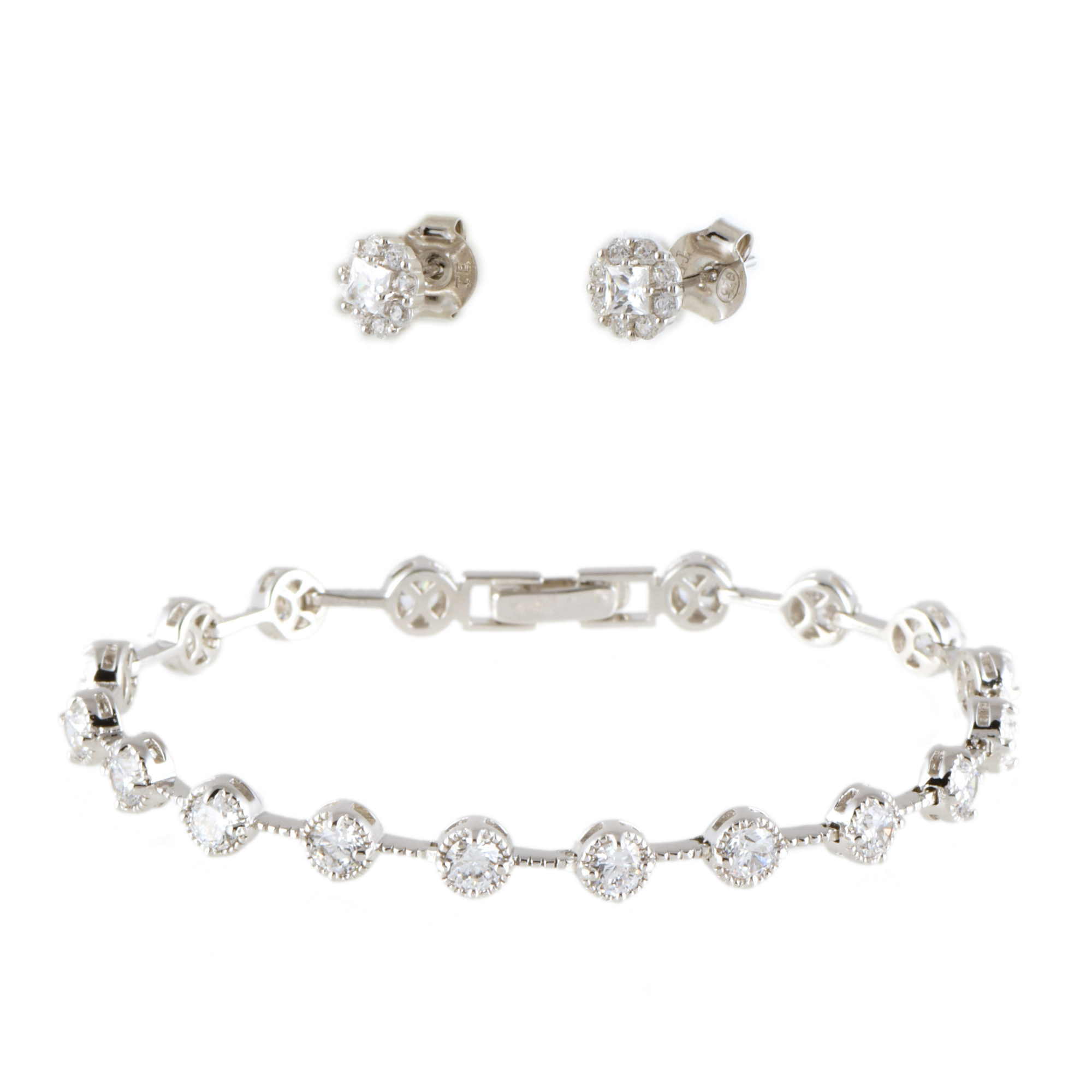 Bracelet and earrings with zircons.