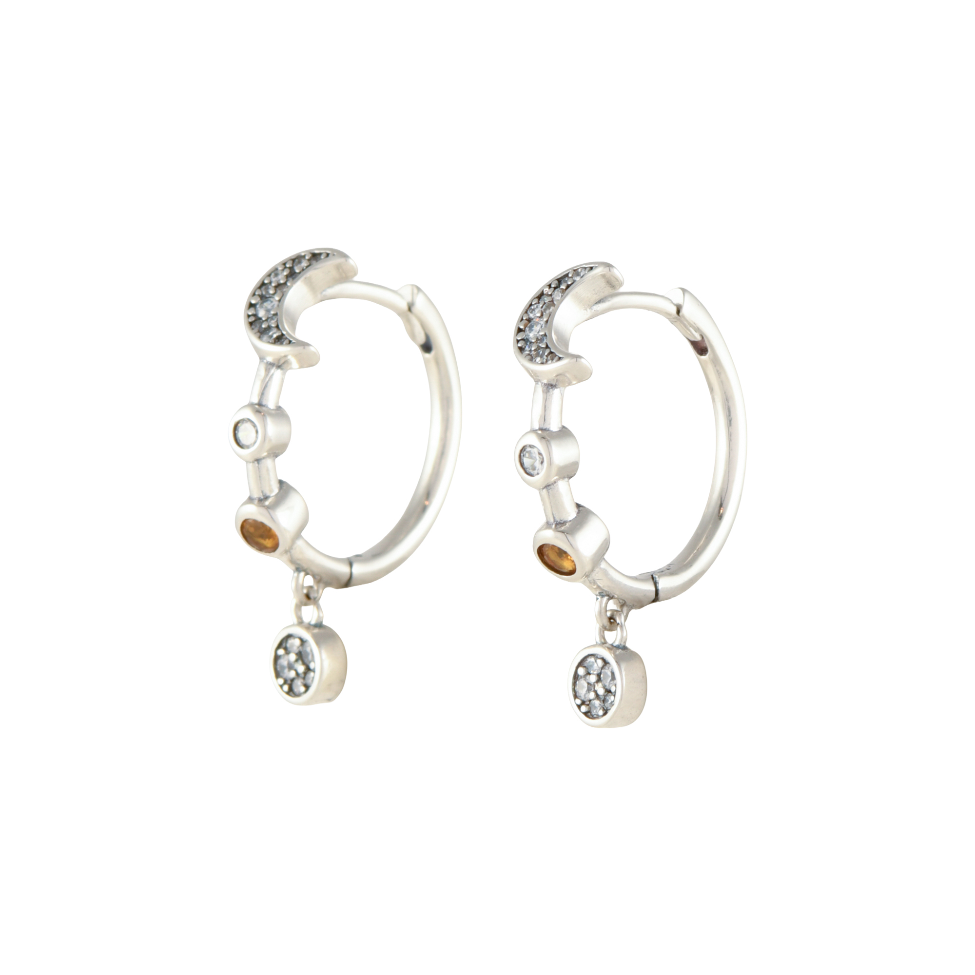 Moon-shaped earrings.