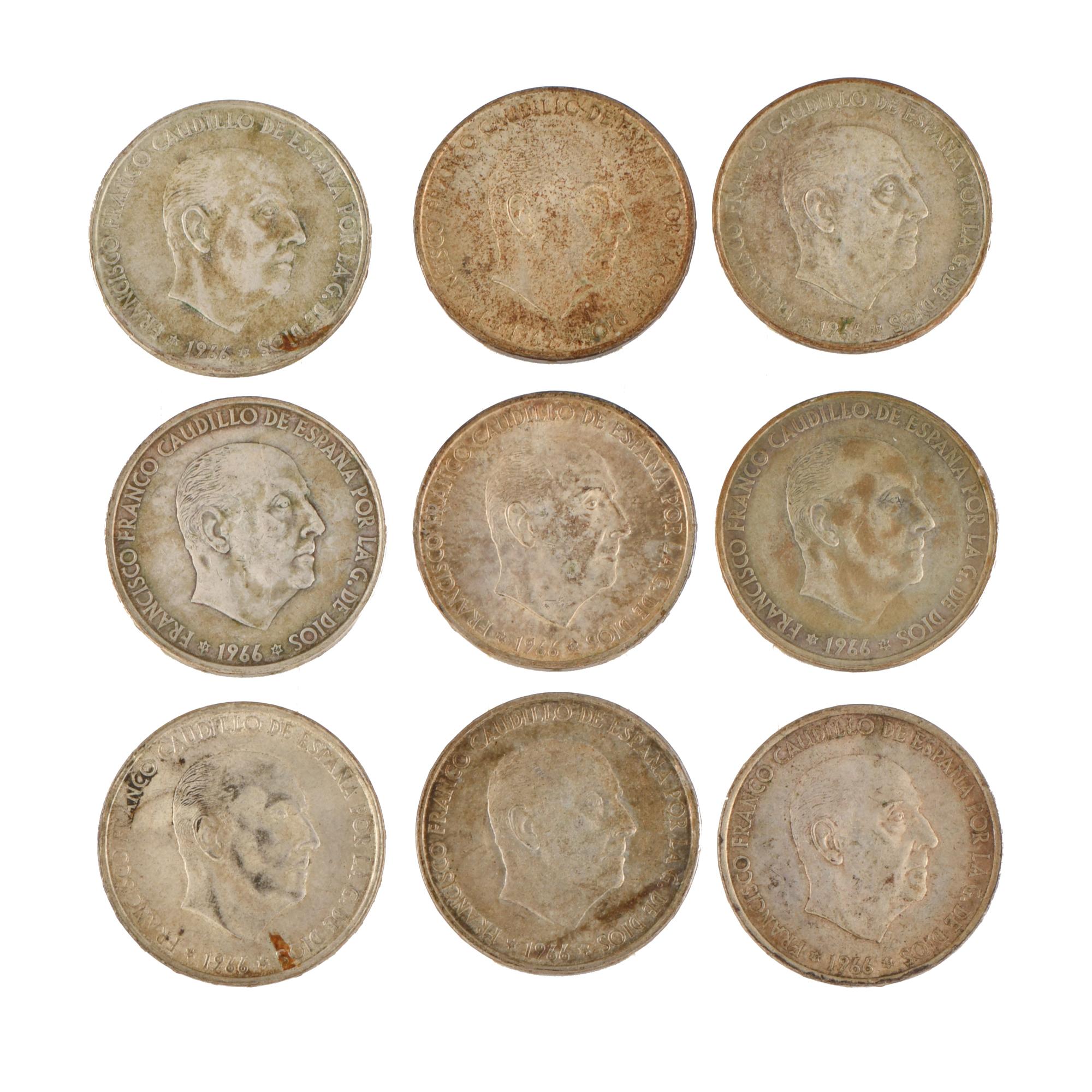 Lot of nine 100-peseta coins.