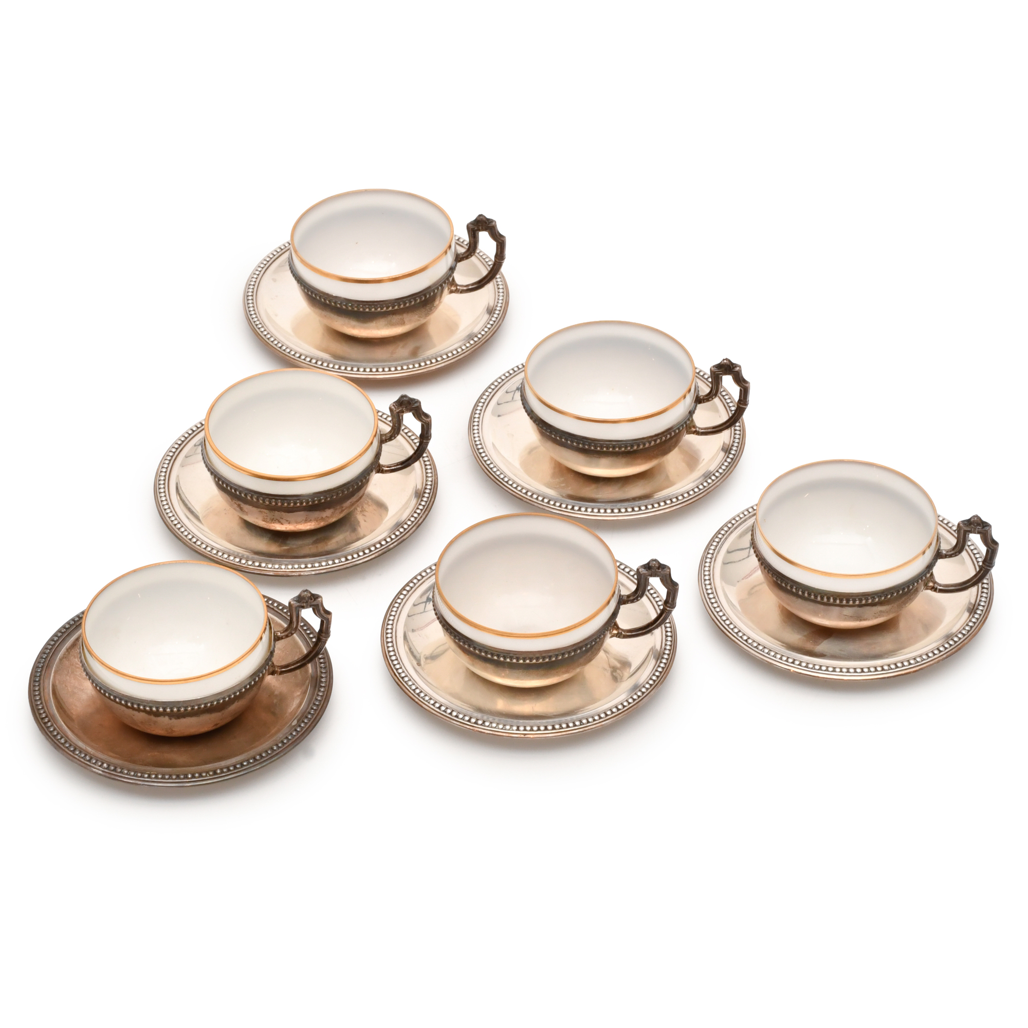 Set of six coffe cups and saucers.