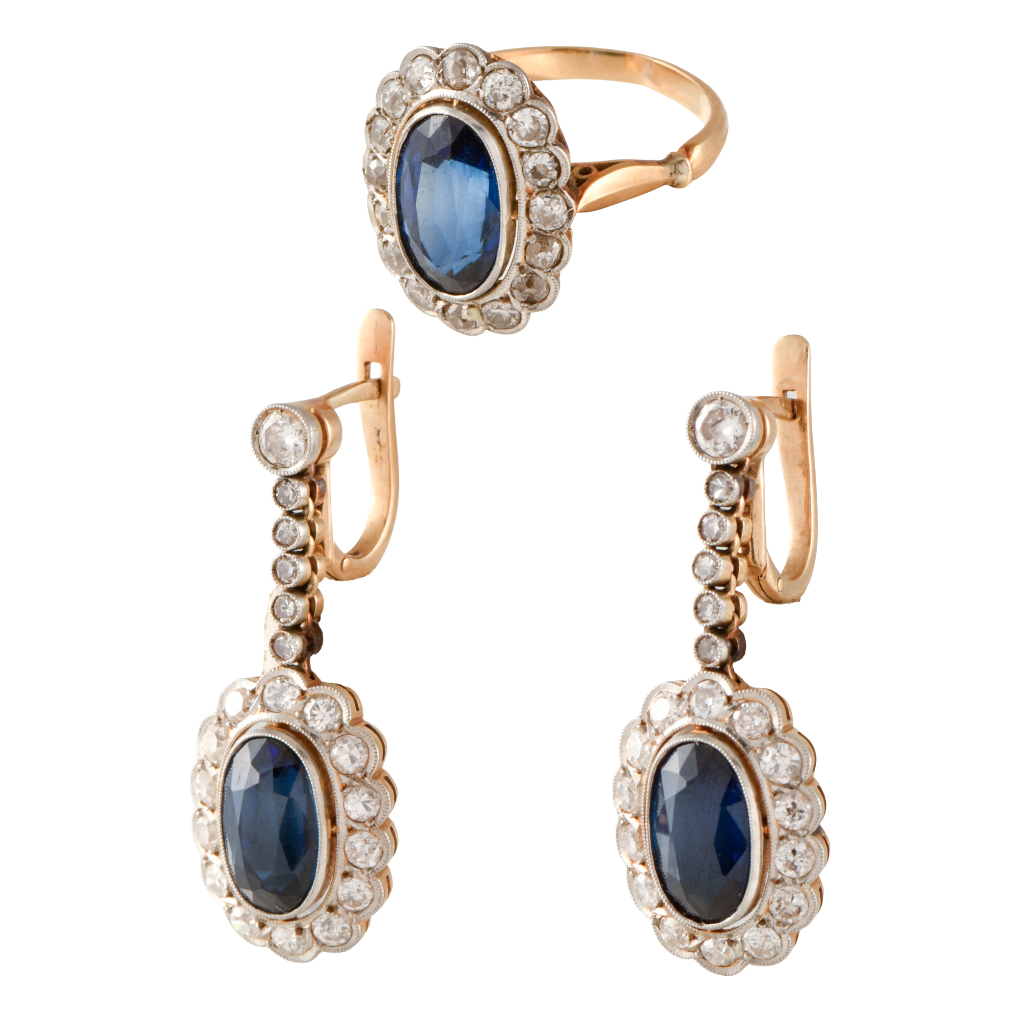 Conjunto de anillo y pendientes con zafiros  orlado rosetón