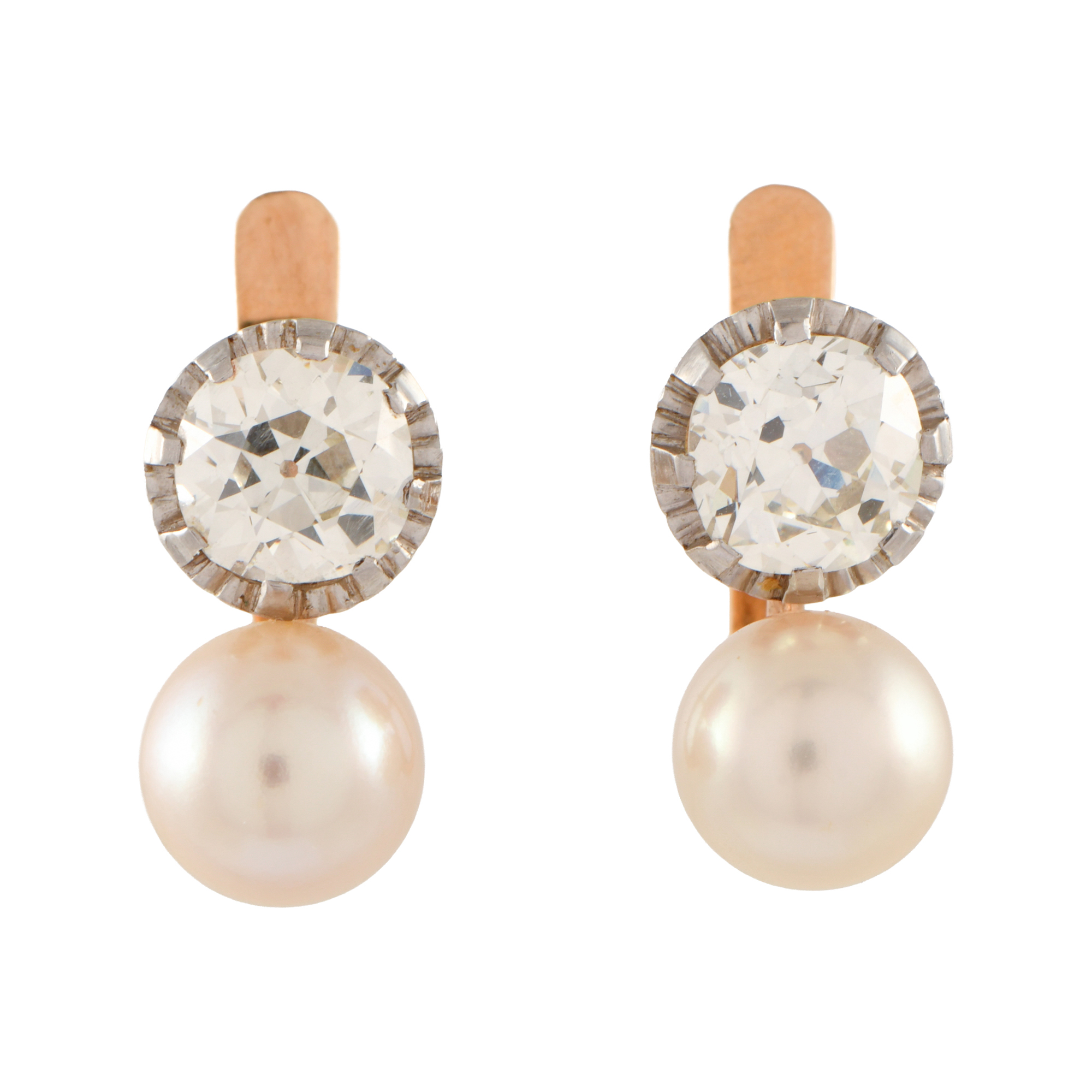 Pendientes tu y yo con diamante y perla.